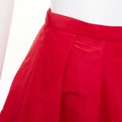 TIBI: gonna midi svasata a trapezio con vita alta e plissettatura sul davanti, in taffetà di seta 100% rosso, taglia US2