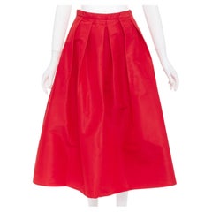 TIBI: gonna midi svasata a trapezio con vita alta e plissettatura sul davanti, in taffetà di seta 100% rosso, taglia US2