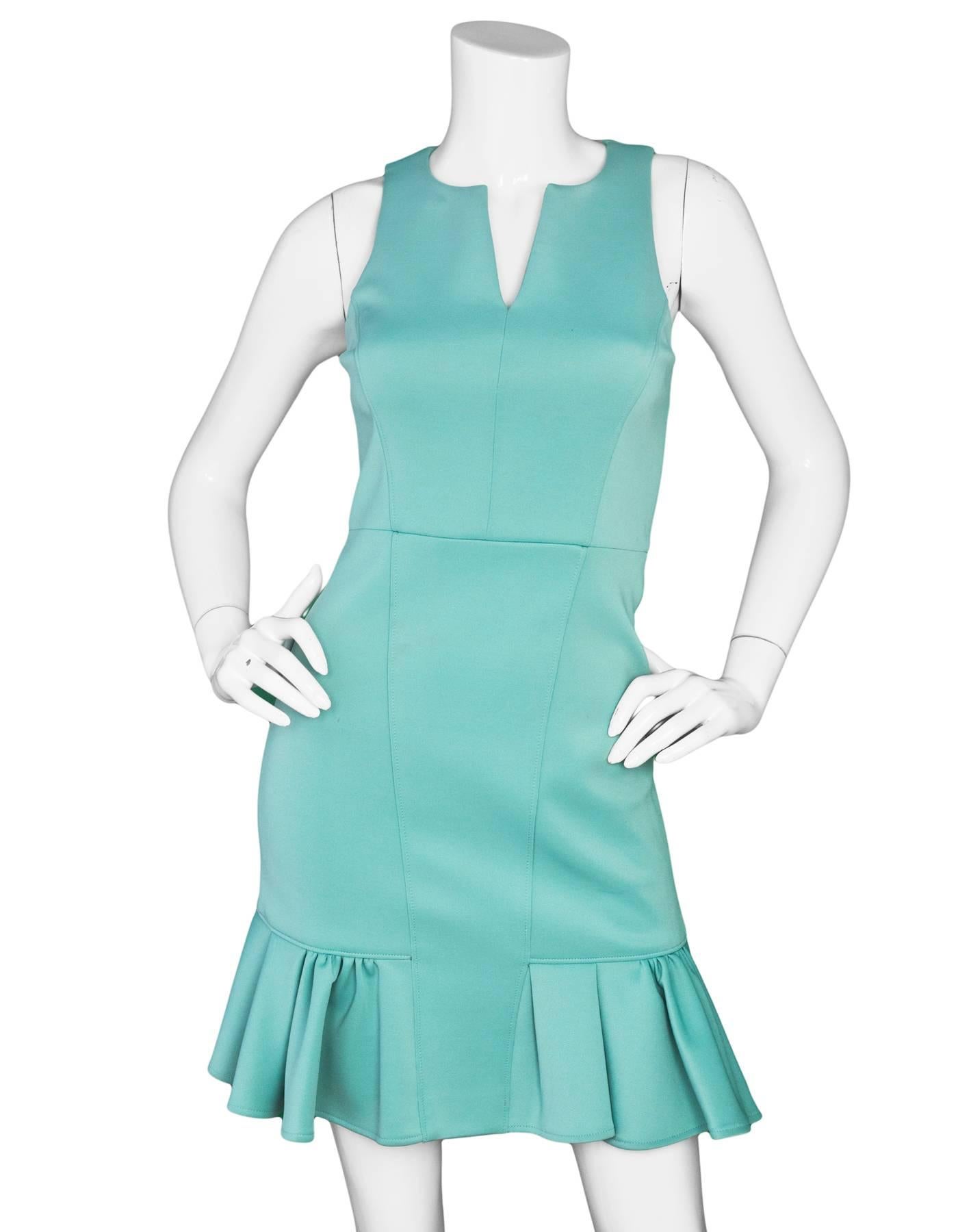 Tibi Sea Foam Green Sleeveless Dress Sz 0

Features flirty ruffle hem

Made In: China
Color: Red
Composition: 88% polyester, 12% elastane
Lining: Black polyester
Closure/Opening: Zip closure at back
Exterior Pockets: None
Interior Pockets: