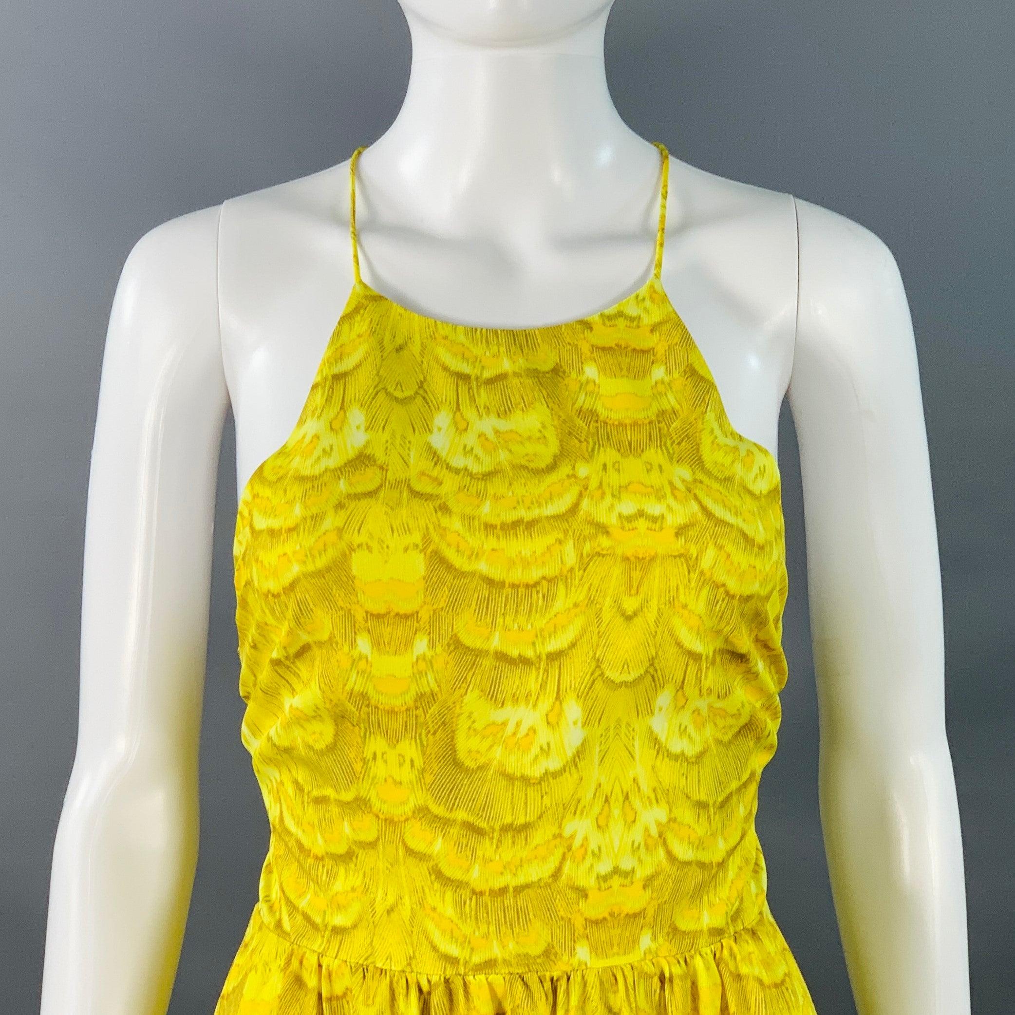 Robe Tibi
en polyester jaune et marron, avec un imprimé de plumes abstraites, un dos nu et un lien croisé dans le dos avec fermeture à glissière invisible.Nouveau avec étiquettes. 

Marqué :   2 

Mesures : 
  Poitrine : 28 pouces Taille : 24 pouces