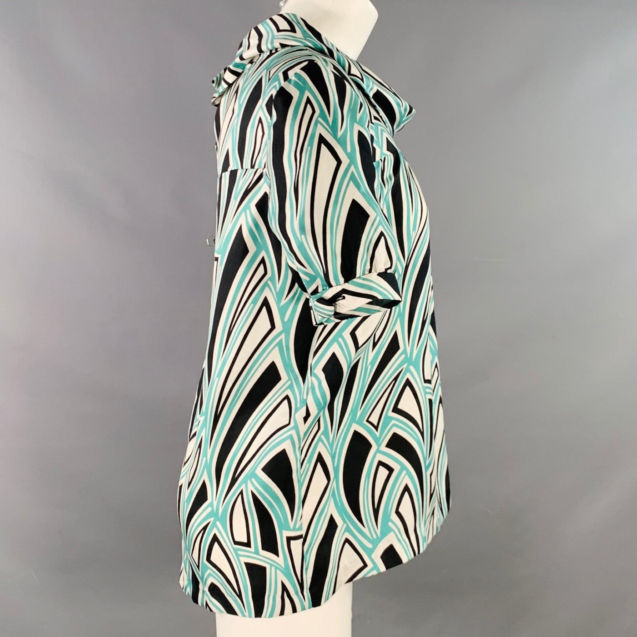 TIBI dress top
in a green, black, and white silk featuring an abstract pattern, short sleeves, and cowl neck.Excellent Pre-Owned Condition. 

Marked:   6 

Measurements: 
 
Shoulder: 15 inches Bust: 39 inches Sleeve: 10 inches Length: 25.5 inches 
