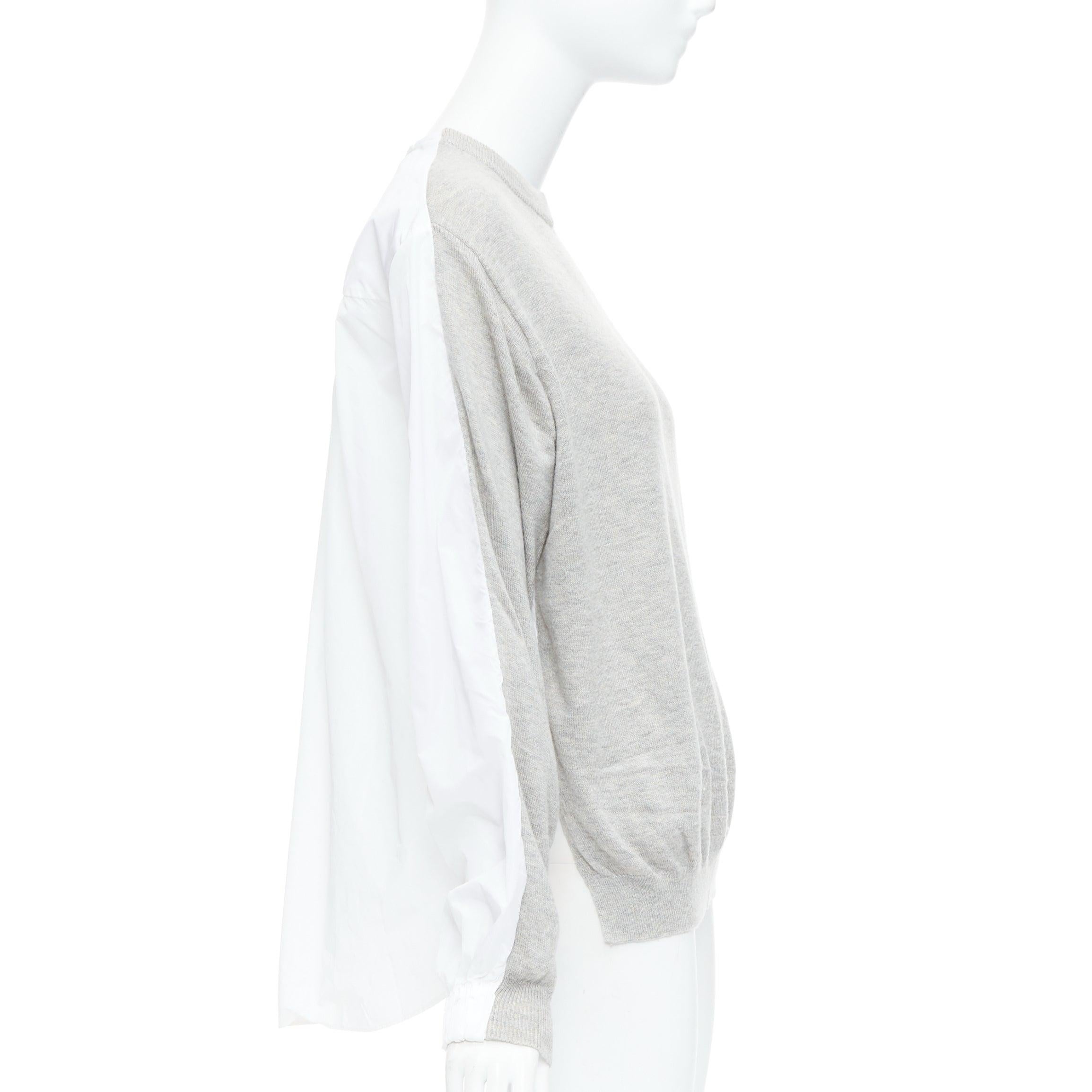 TIBI white grey nylon merino wool contrast ruched back sweater XS
Reference: YIKK/A00199
Brand: Tibi
Material: Merino Wool, Nylon
Color: Grey, White
Pattern: Solid
Closure: Slip On
Extra Details: Nylon back.
Made in: China

CONDITION:
Condition: