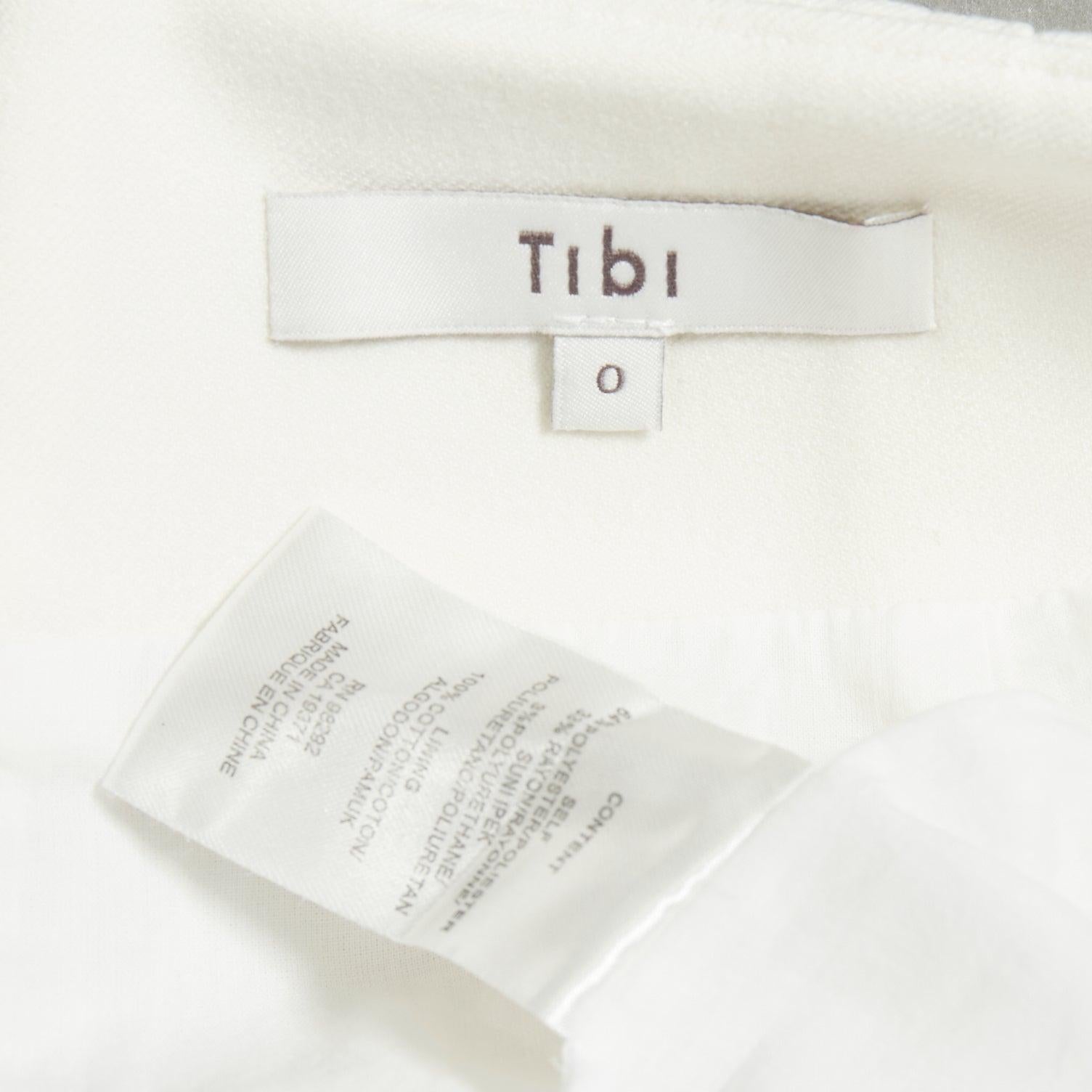 TIBI asymmetrischer, abgeschrägter Bleistiftrock mit weißen Strukturknöpfen, US0 XS im Angebot 3