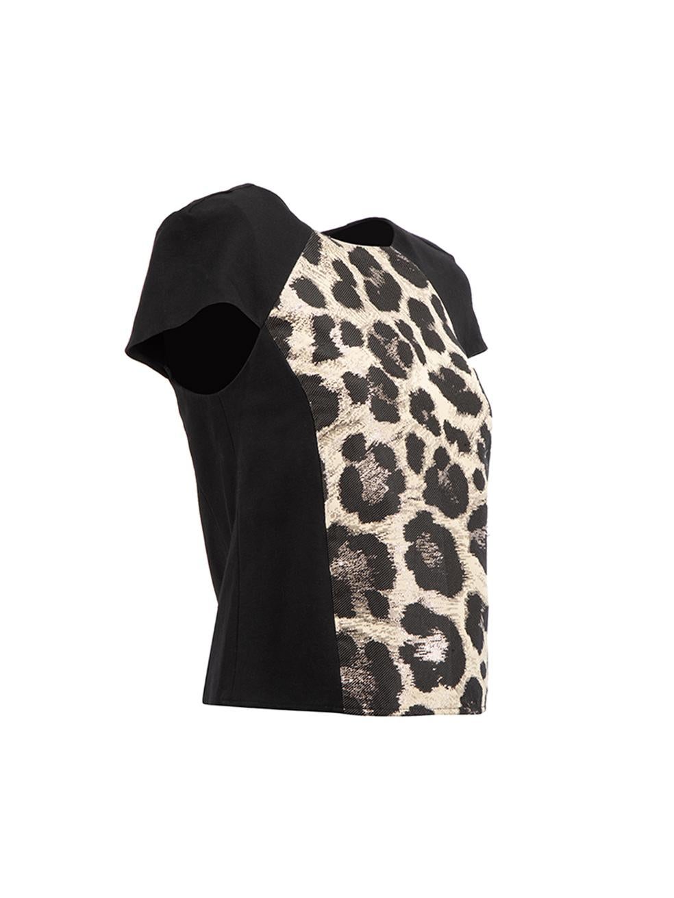 CONDITION is Very good. Minimal wear to top is evident. There are a few pulls to thread at the front of this used Tibi designer resale item. 



Details


Black

Polyester

Cap sleeves top

Leopard print panelled

Round neckline

Back zip closure