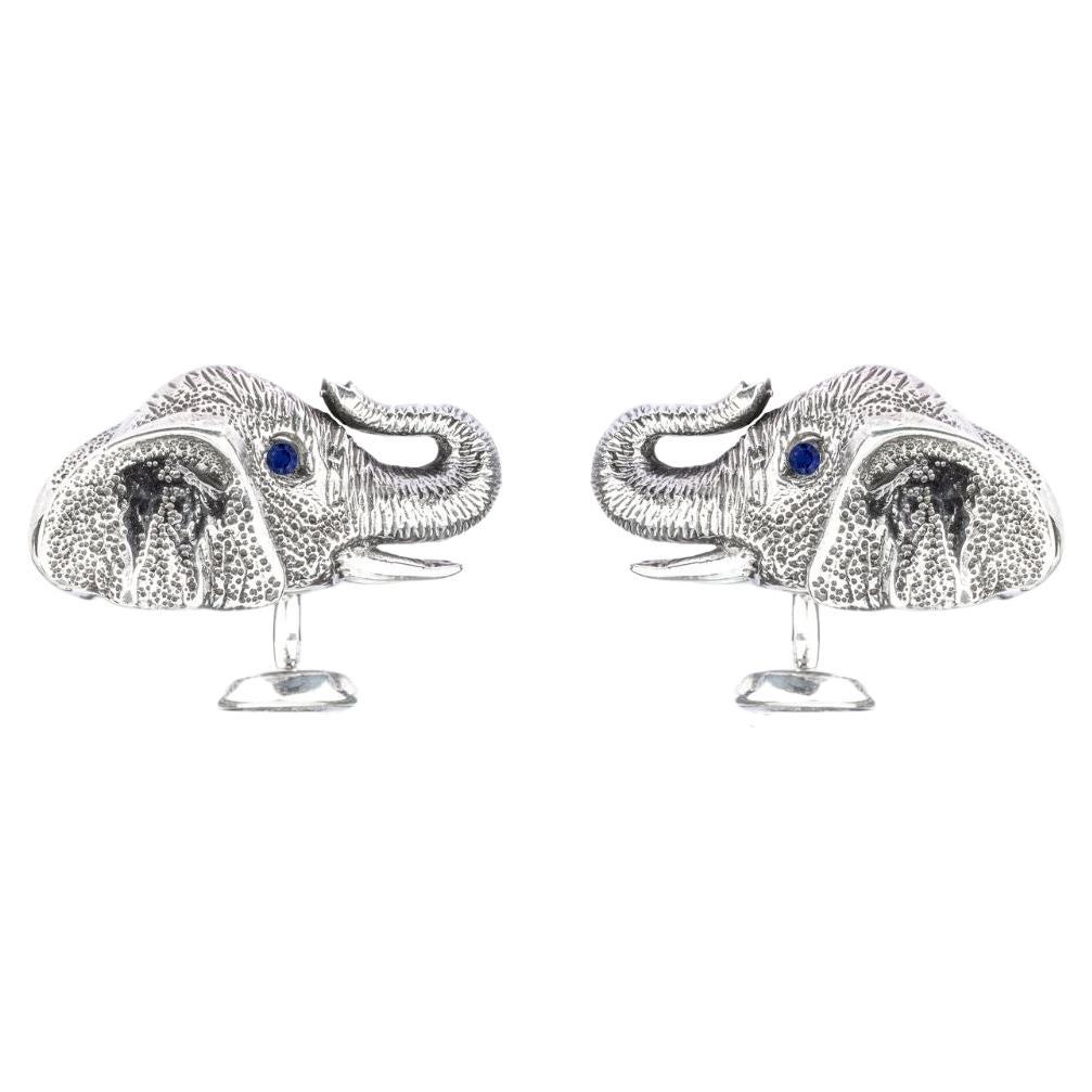 Tichu Manschettenknopf aus Sterling Silber mit blauem Saphir und Kristallquarz mit Elefantenhinterkopf