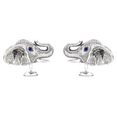 Tichu Manschettenknopf aus Sterling Silber mit blauem Saphir und Kristallquarz mit Elefantenhinterkopf
