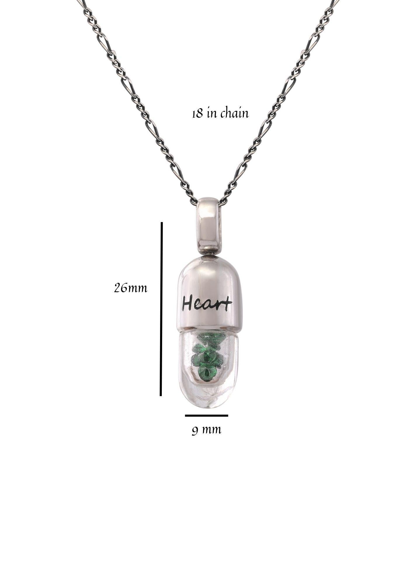 The Fourth Chakra or the Heart Chakra is the home of Unconditional Love. The Heart Chakra is associated with Color Green. 

Each Heart Chakra Pendant is handcrafted in Sterling Silver, specially Capsule cut Crystal Quartz and filled with Tsavorite.