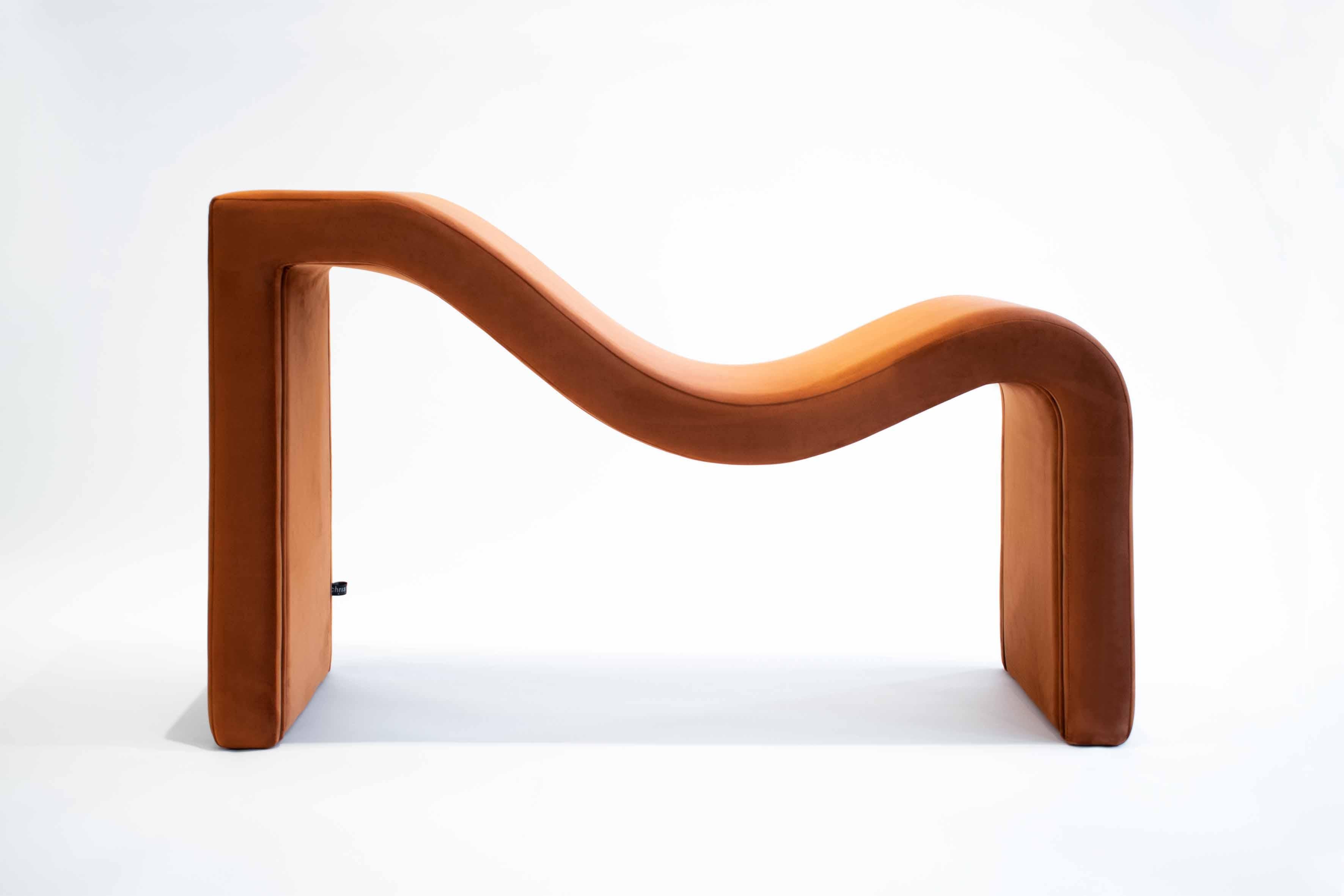 Tide Bench by Studio Christinekalia
Dimensions: W 40 x D 180 x H 45 cm
Materials: Wood, Macro Plush Fabric. 

Christine Kalia is a design studio exploring modes of spatial relations between architectural, interior and product design. The