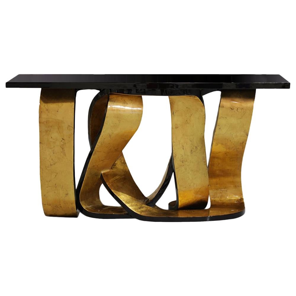 Tie Gold Console Table with Black Lacquered Wood Veneered Top For Sale