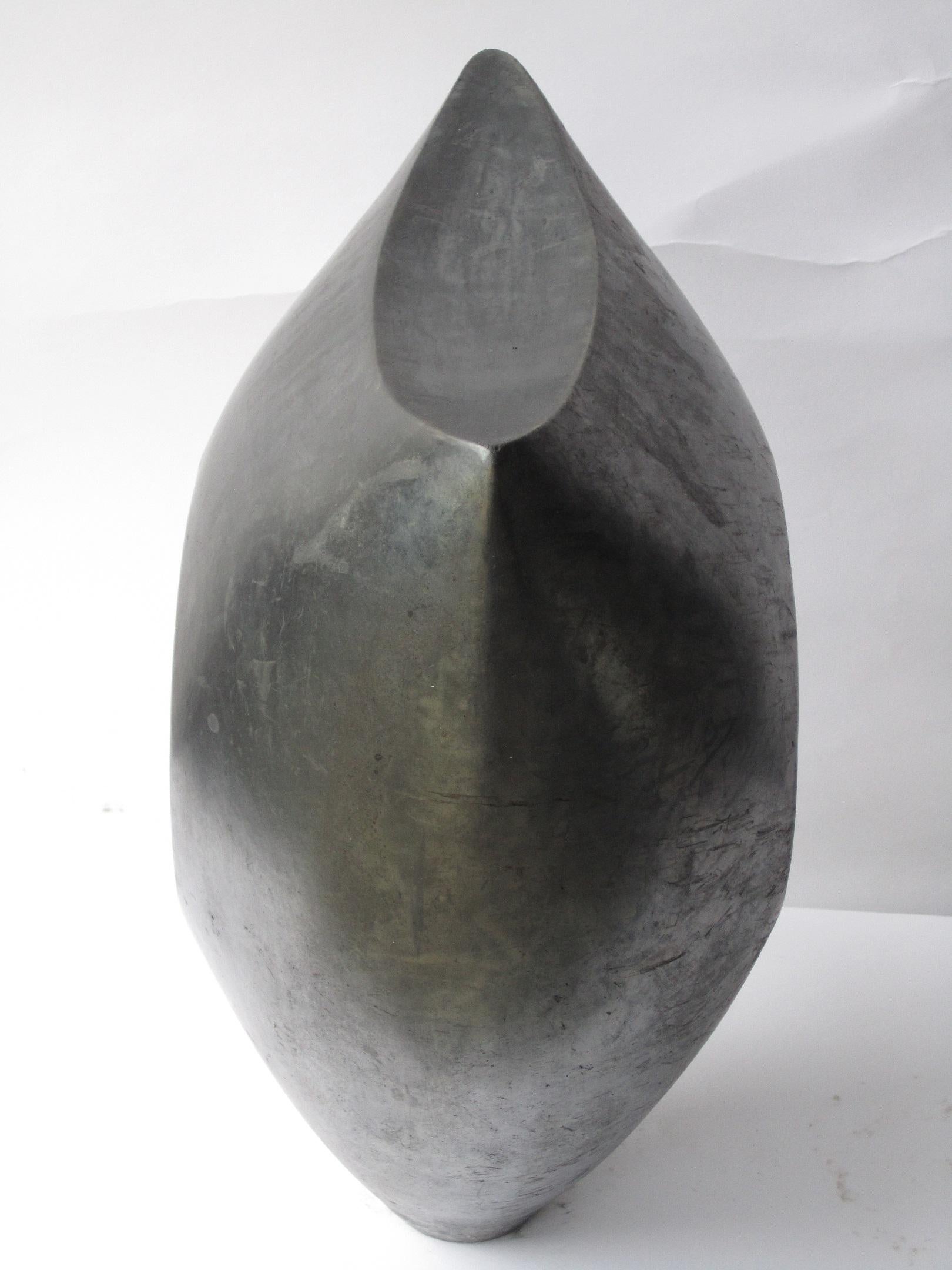 Black Sun (2019) is a one-off ceramic sculpture by contemporary artist Tien Wen whose work revolves around the idea of abstraction and the pureness of shapes. Thanks to the raku technique, dear to the artist, the sculpture takes on a metallic tint