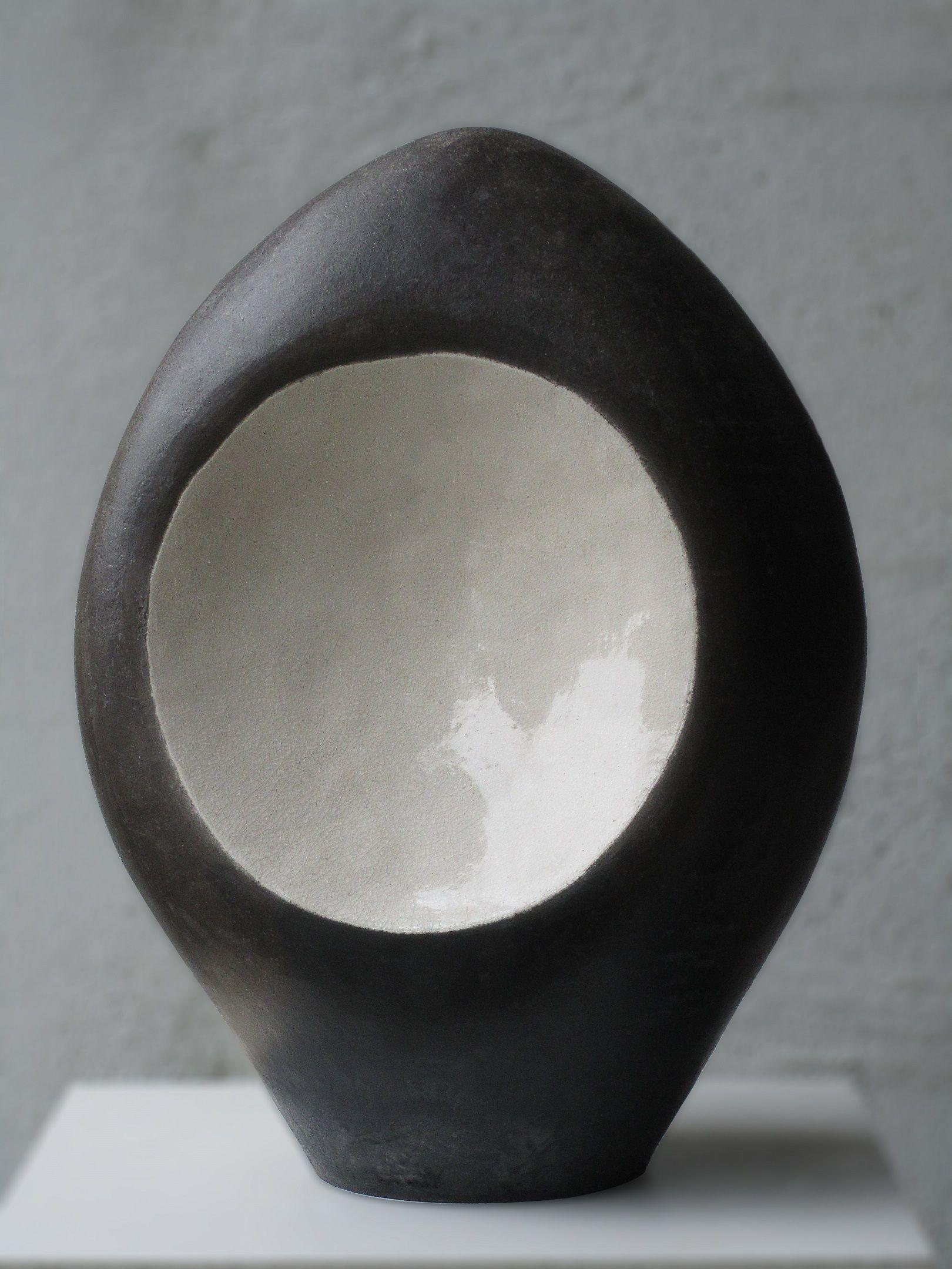 Cell is a unique ceramic sculpture by contemporary artist Tien Wen, dimensions are 33 × 26 × 17 cm (13 × 10.2 × 6.7 in). 
The sculpture is signed and comes with a certificate of authenticity. 

This abstract and minimalist artwork first appeals by