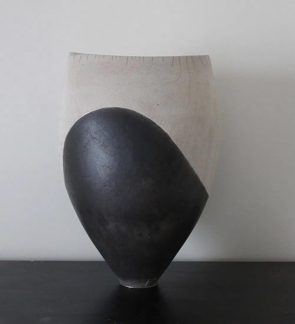 Closed Vase is a unique ceramic sculpture by contemporary artist Tien Wen, dimensions are 41 × 28 × 24 cm / 16.1 × 11 × 9.4 in. The sculpture is signed and comes with a certificate of authenticity. 

This abstract and minimalist artwork first