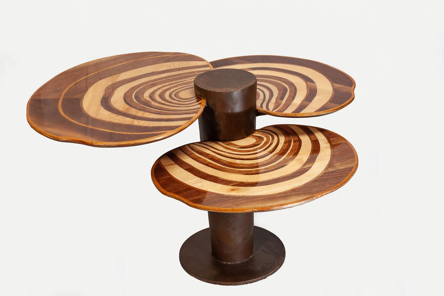 Invite a piece of nature into your home with the Maitake Walnut Coffee Table. This remarkable design draws inspiration from forest mushrooms and the natural curves only found in nature. Each table is handcrafted with walnut, allowing you to