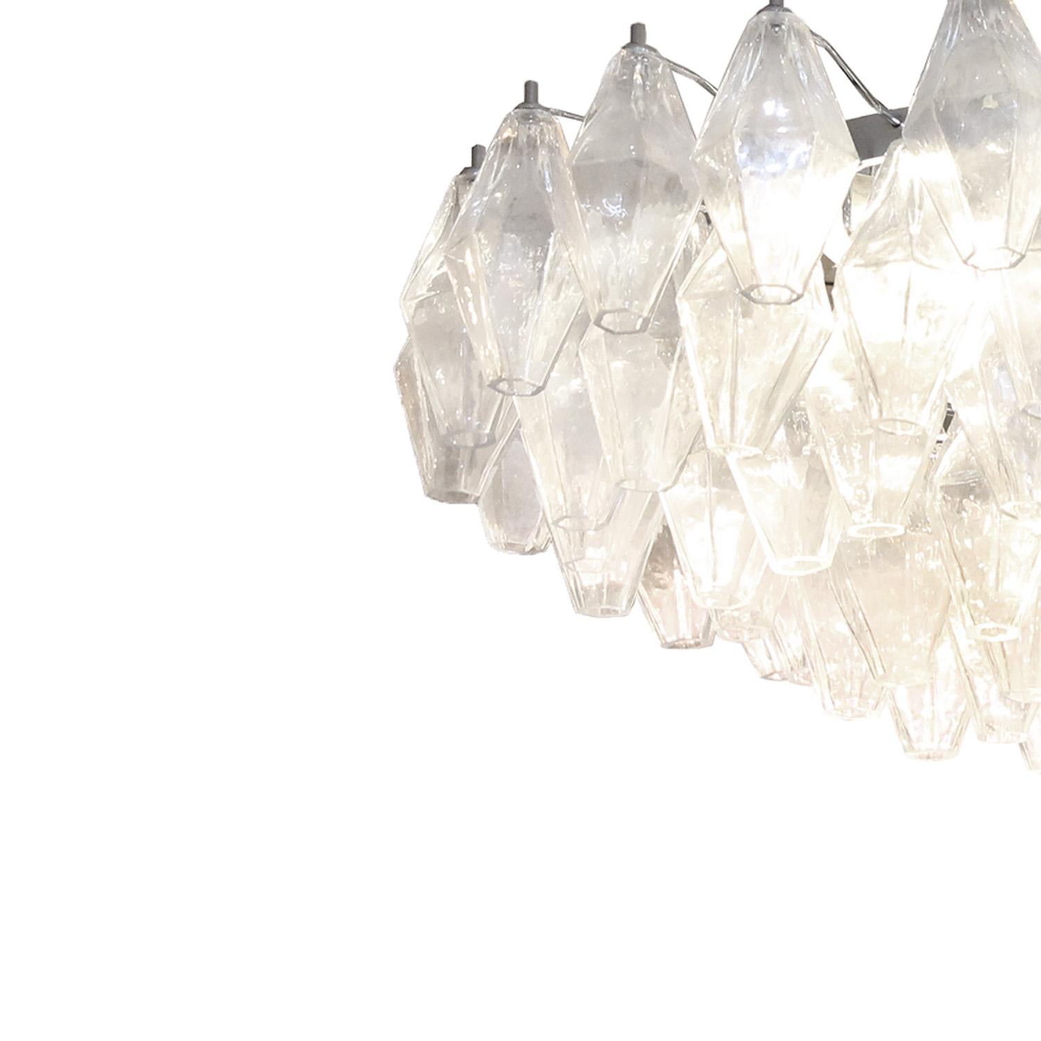 Murano clear glass polyhedron, tiered pendant fixture with chrome body. Italy.

Custom dimensions and glass color are available. Please inquire with Venfield. Lead time is 6-8 weeks. 

Dimensions:
Diameter: 24 inches
Height:  12 inches


Condition: