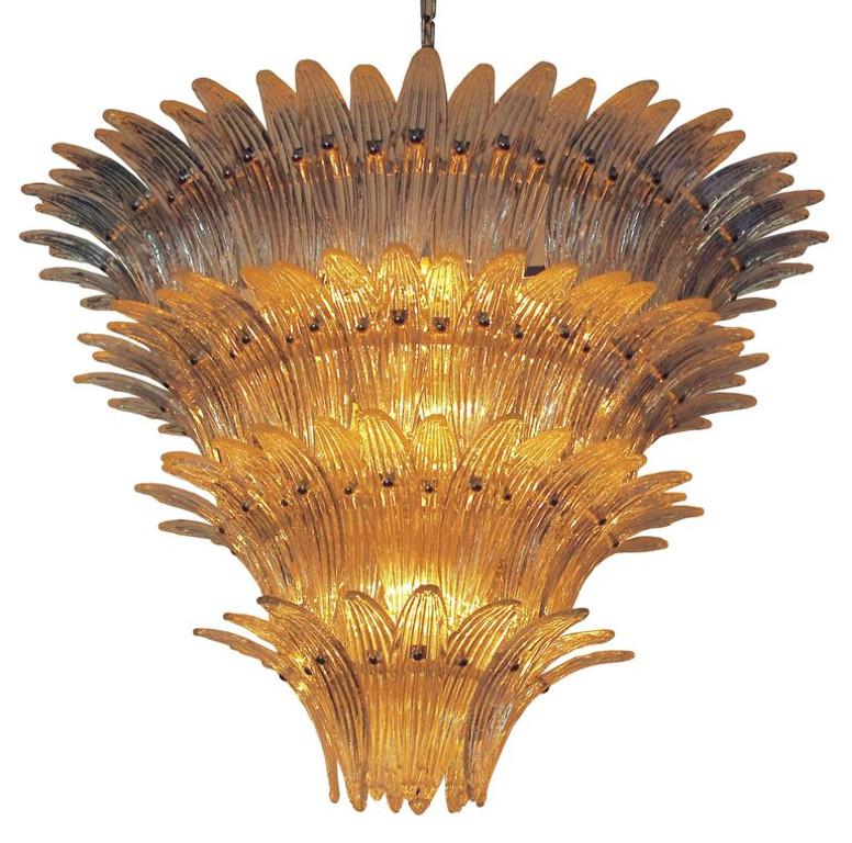 Italian Palmette chandelier with clear Murano glass leaves mounted on chrome metal finish frame by Fabio Ltd / Made in Italy
12 lights / E26 or E27 type / Max 60W each
Measures: Diameter 40 inches / height 30 inches plus chain and canopy
Order only