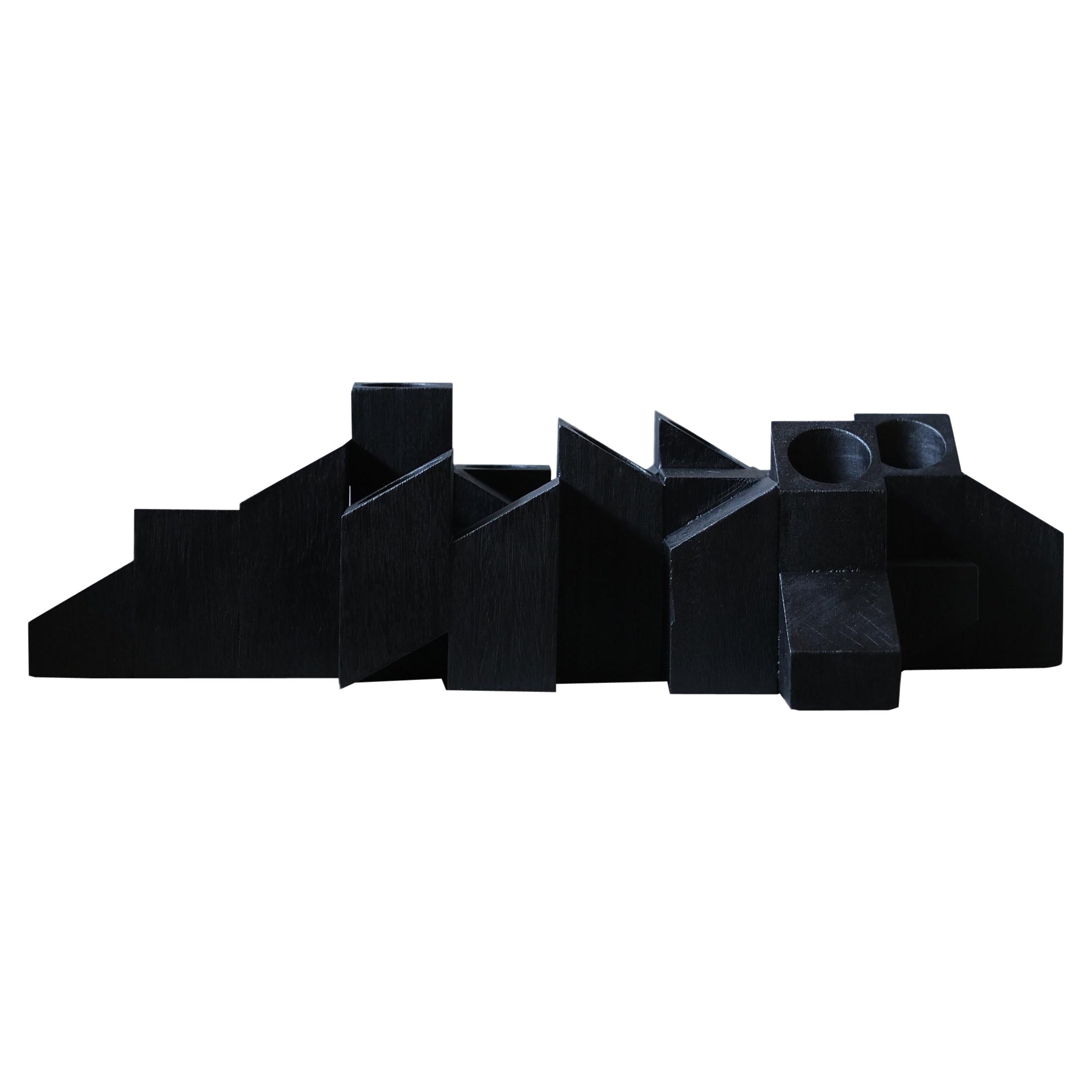 Tiered Structure Black Skyline Candle Light in Iroko Wood by Arno Declercq