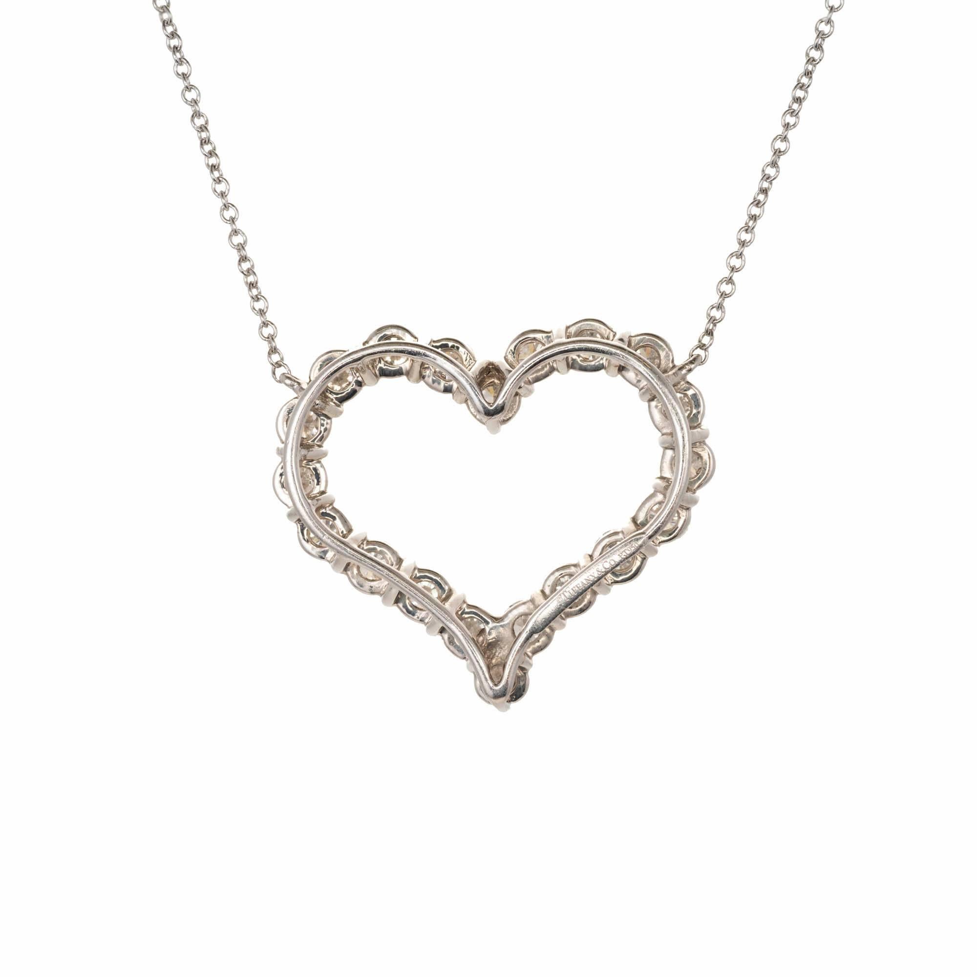 Tiffany & Co diamond heart pendant necklace. Large size with 20 brilliant cut diamonds 1.96 carats in platinum on a 16 inch chain. Both the heart and the chain are signed.

20 round diamonds ideal cut F VS approximate 1.96 carats
Platinum
Tested: