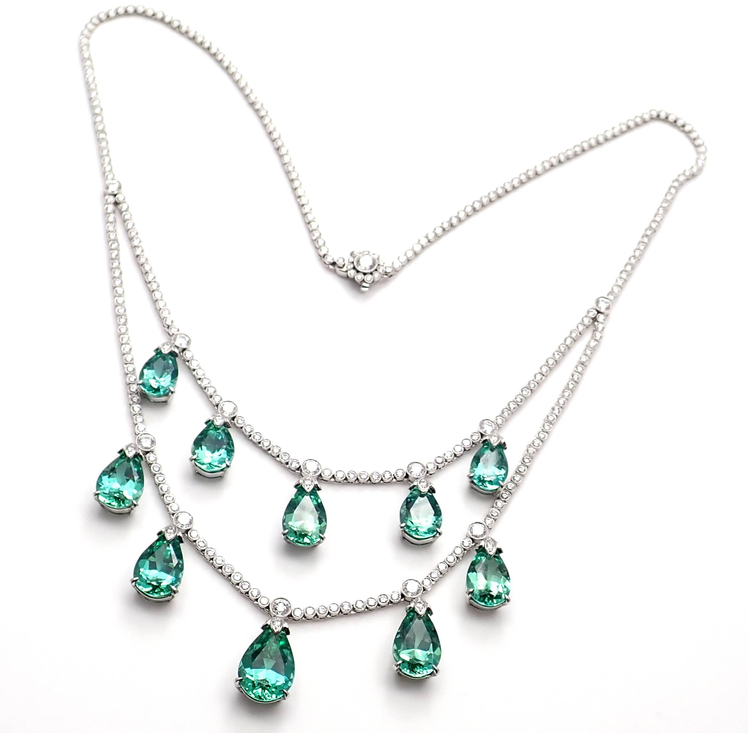 Platinum Diamond Green Gourmaline Necklace by Tiffany & Co. 
With 320 round brilliant cut diamonds G color VVS clarity total weight approx. 5.25ct
10 pear shape green tourmalines total weight approx. 22.46ct
This necklace comes with Tiffany & Co