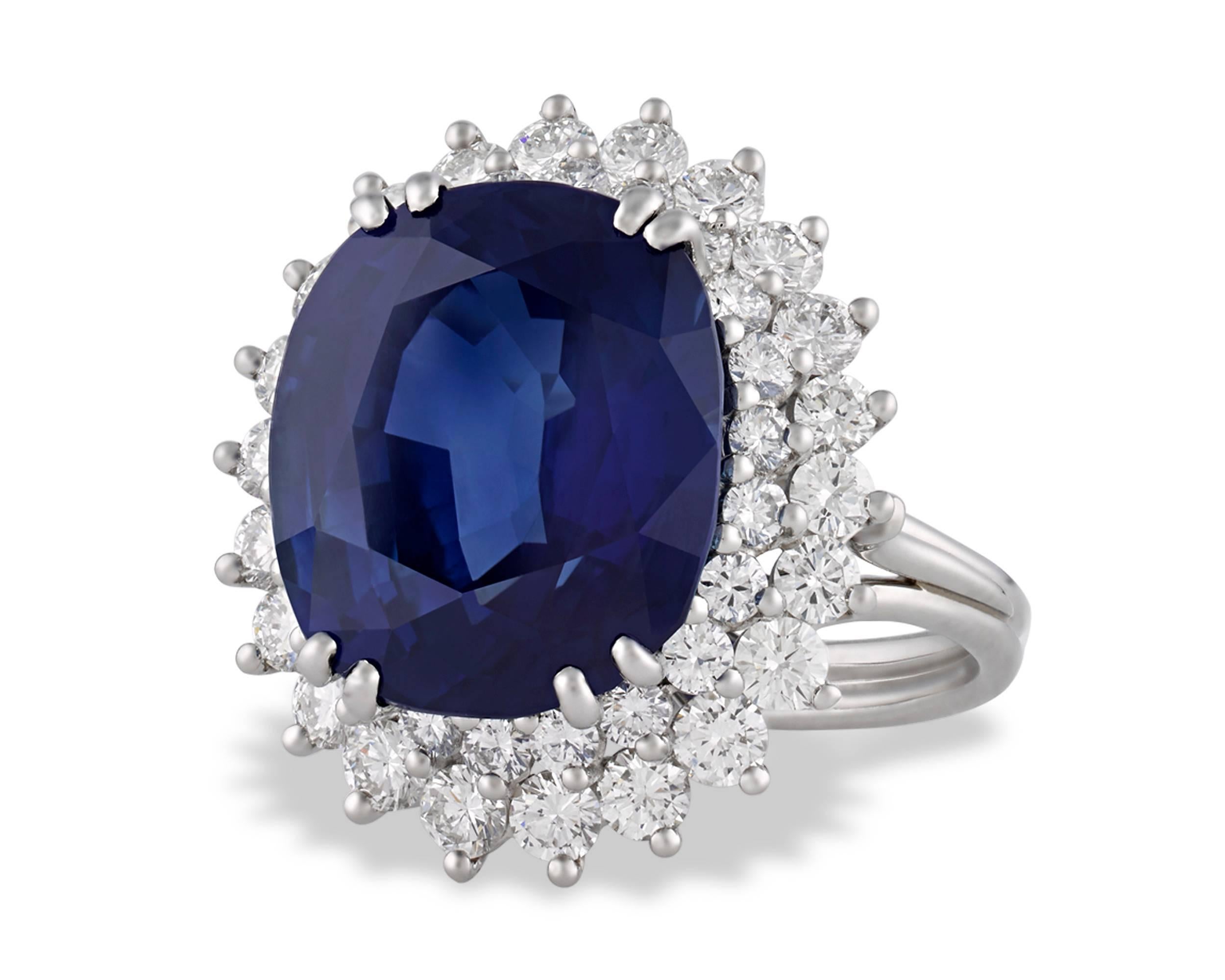 Centering this magnificent Tiffany & Co. ring is a breathtaking 10.93-carat sapphire certified by the American Gemological Laboratories to be of Ceylon (Sri Lanka) origin. With its stunning natural beauty and monumental size, this cushion-shaped,