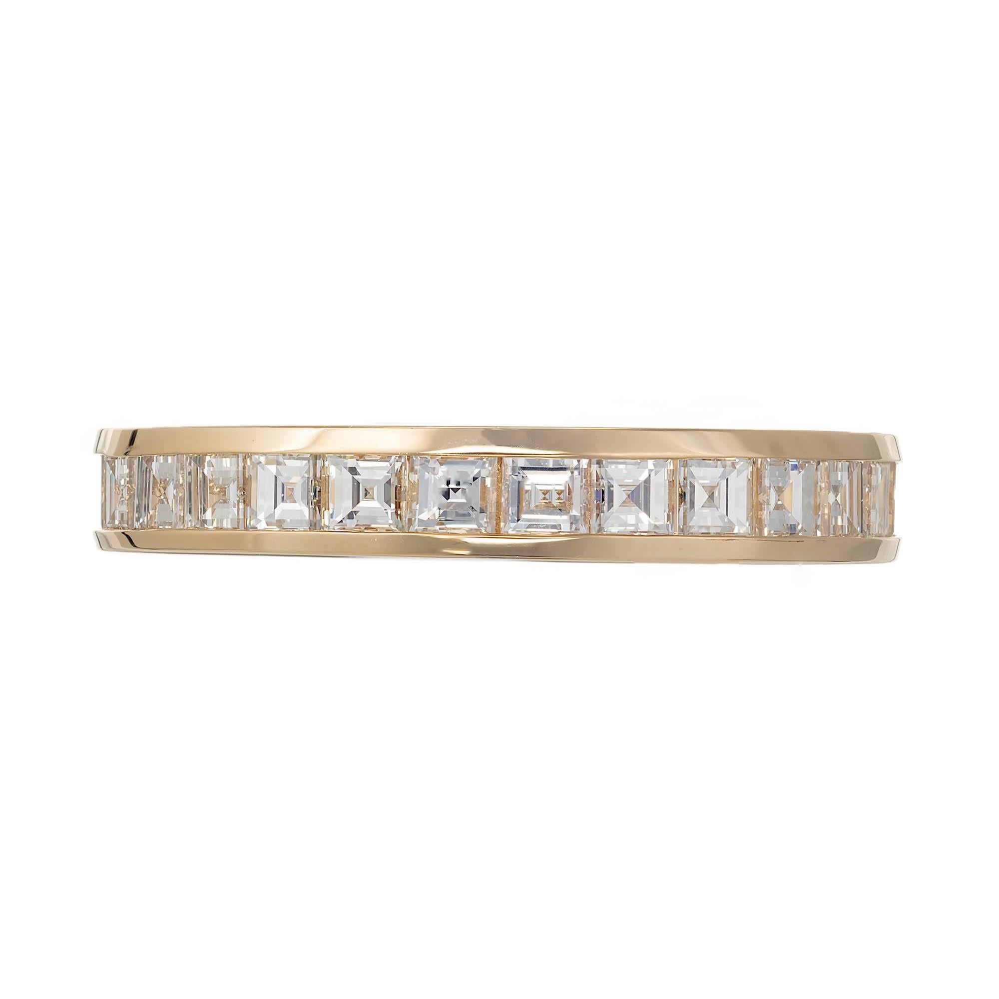Authentic Tiffany & Co solid 18k yellow gold wedding band with channel set square diamonds. 

28 2mm square diamonds, E - F  VVS1 - VS1, approx. total weight 1.70cts
Size 8     
Width: 3.5mm    
Depth: 1.84mm    
2.7 grams    
Stamped: Tiffany + Co