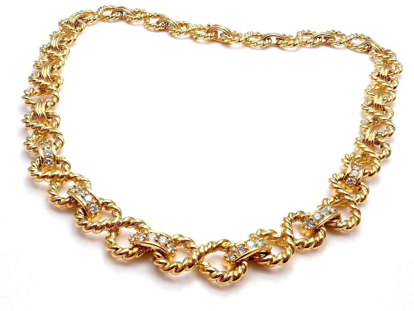 18k Yellow Gold Diamond Figure 8 Rope Link Necklace by Tiffany & Co. 
With 30 round brilliant cut diamonds VS1 clarity and G color total weight approx. 0.60ct
Details: 
Length: 15