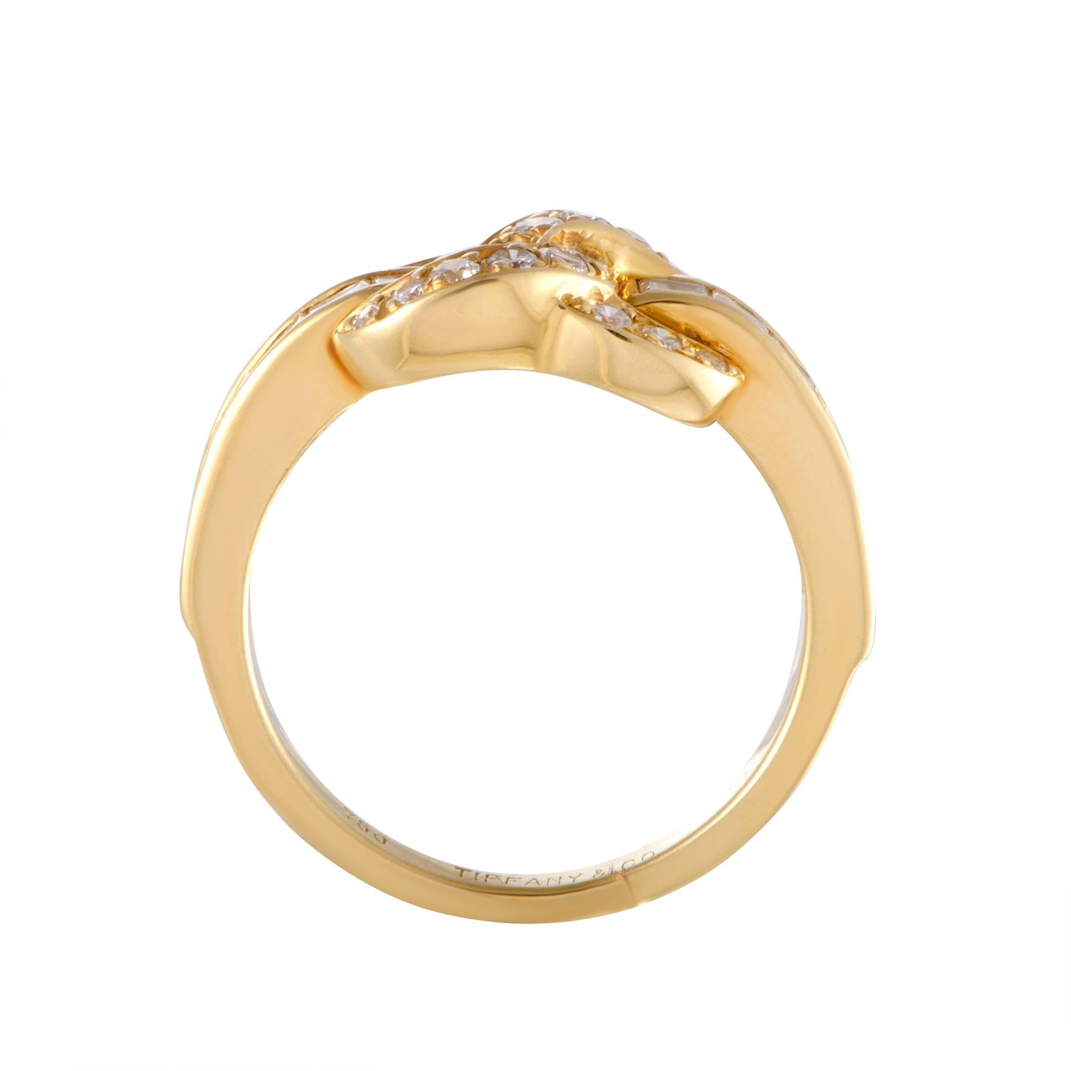 Embodying the renowned values of Tiffany & Co. designs, this gorgeous ring offers a look of timeless elegance and refined allure. The ring is made of classic 18K yellow gold and decorated with diversely cut diamonds that amount to 0.85 carats.
Ring