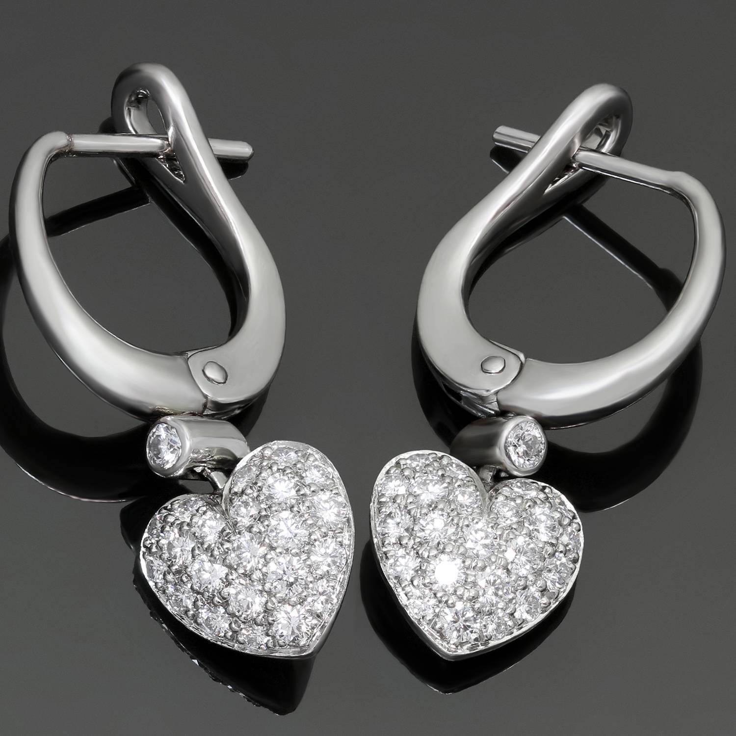 These gorgeous Tiffany earrings are crafted in platinum and feature sparkling heart-shaped drops set with brilliant-cut round diamonds weighing an estimated 0.94 carats. Made in France circa 2003. Measurements: 0.35