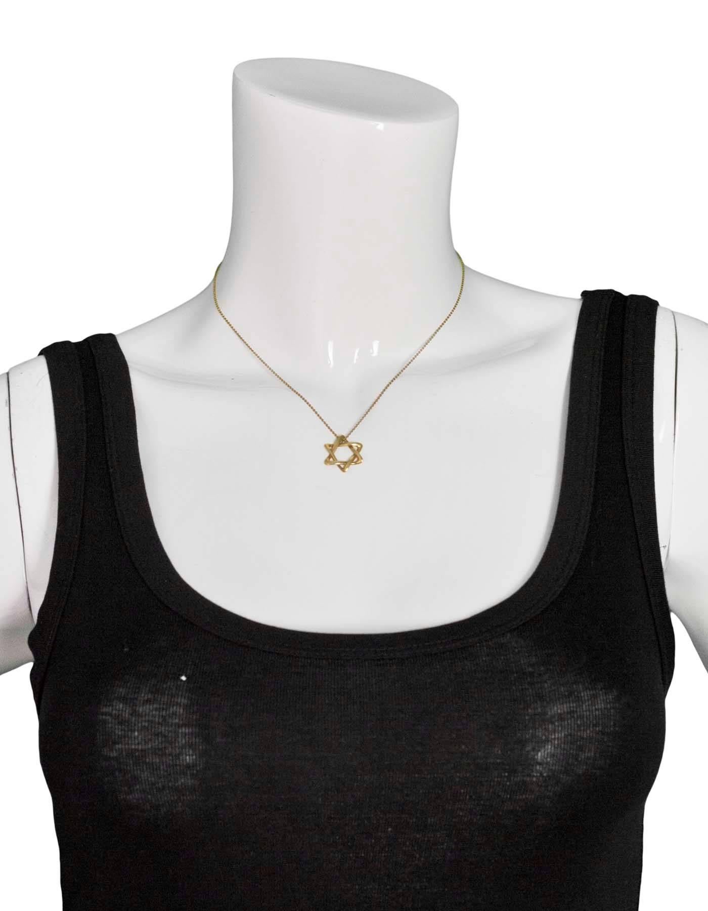Tiffany & Co. Elsa Peretti 18k Yellow Gold 18mm Star Of David Necklace

Made In: Spain
Color: Gold
Materials: 18k gold
Closure: Jump ring closure
Stamp: Tiffany & Co Peretti Spain 18k
Retail Price: $1,050 + tax
Overall Condition: Very good pre-owned