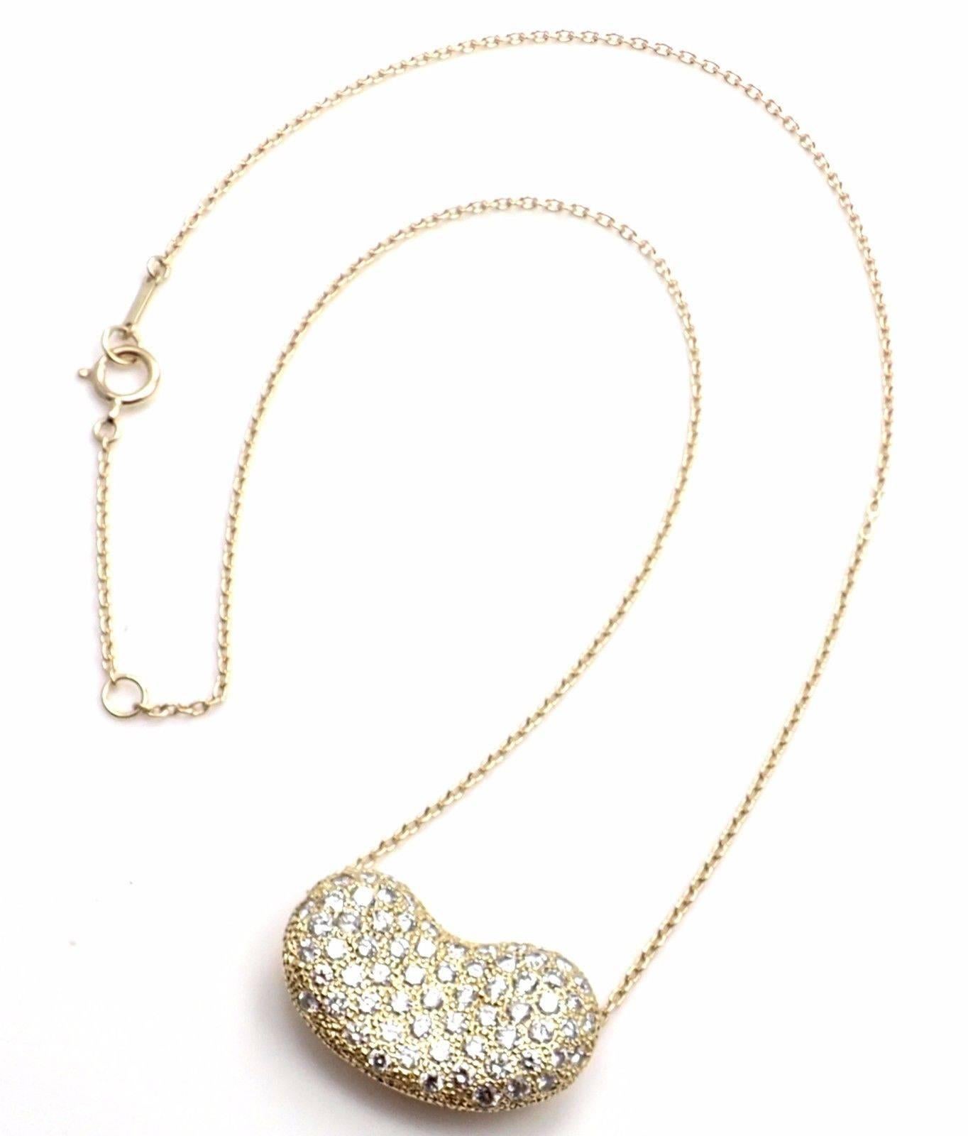18k Yellow Gold Diamond Large Bean Pendant Necklace by Elsa Peretti for Tiffany & Co.
With Round brilliant cut diamonds VS1 clarity, E color total weight approx. 2.13ct
Details:
Length: 16
