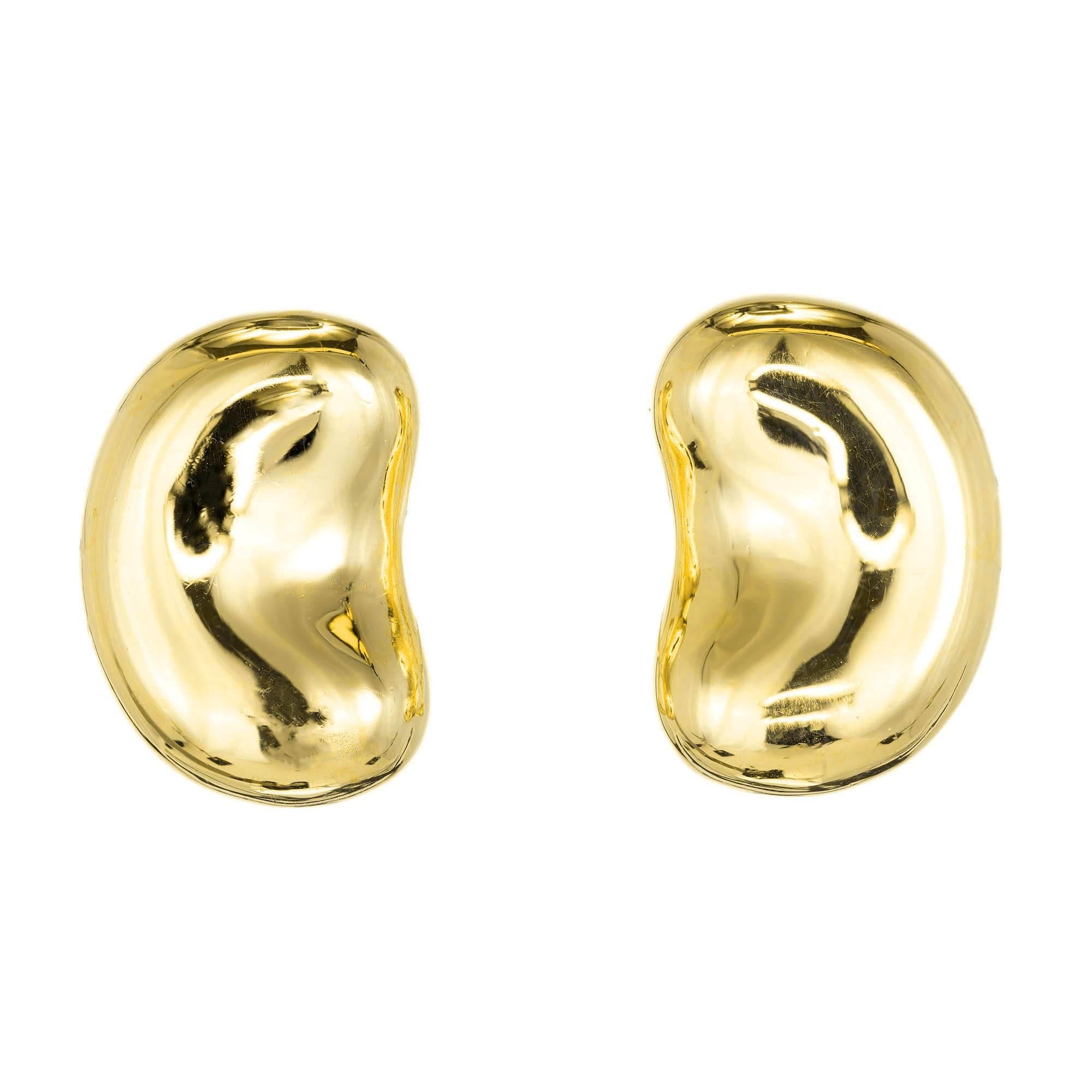 Tiffany & Co Elsa Peretti 18k yellow gold large size clip post earrings. 

18k yellow gold
Top to bottom: 21.51mm or .85 inch
Width: 15mm or .59 inch
Depth: 6.94mm
18.8 grams
Tested: 18k
Stamped: 750
Hallmark: Tiffany & Co Peretti