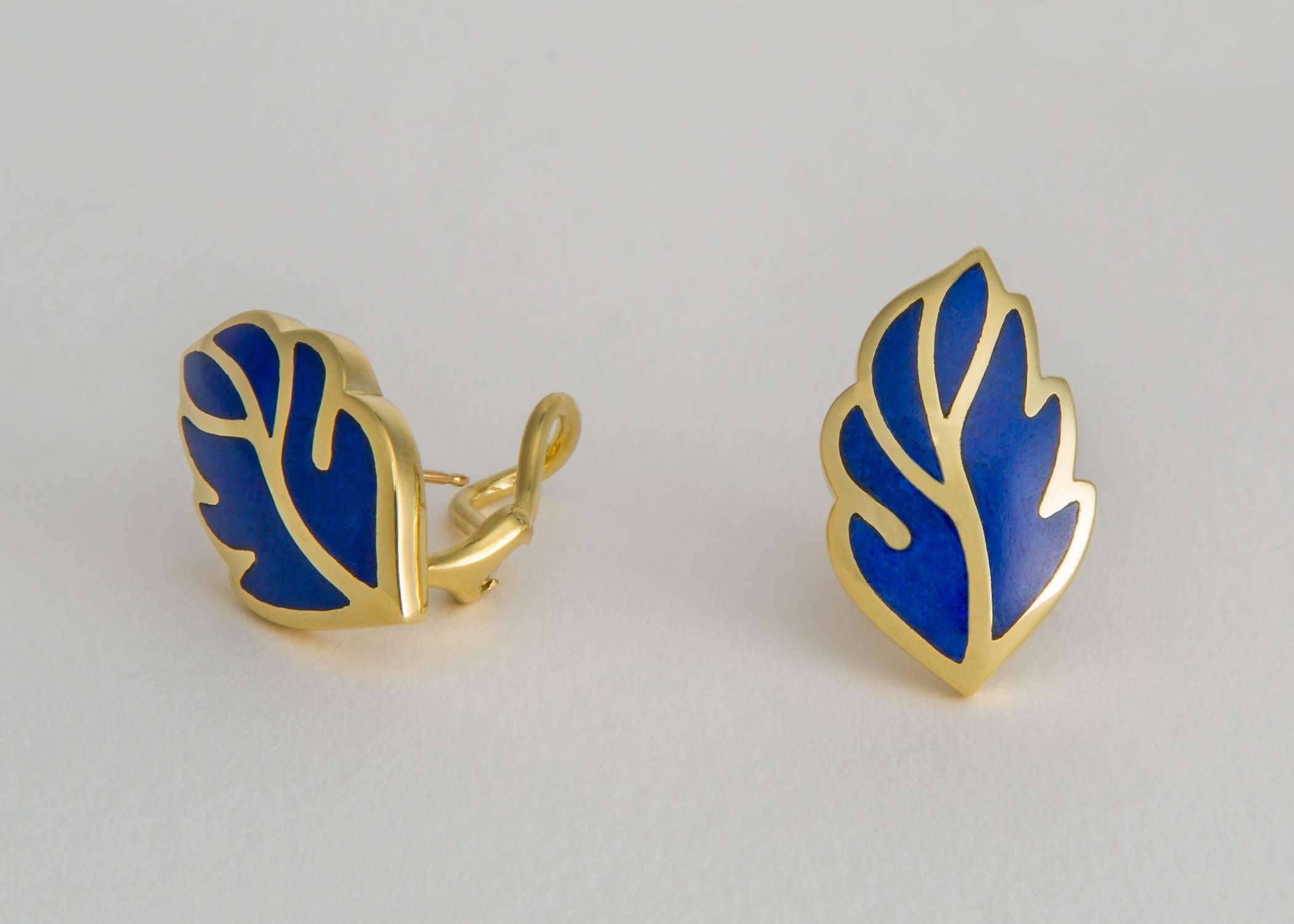 Rich lapis is inlayed in a soft easy to wear leaf shaped earring. Tiffany quality and design all the way. Approximately 1 inch in length.