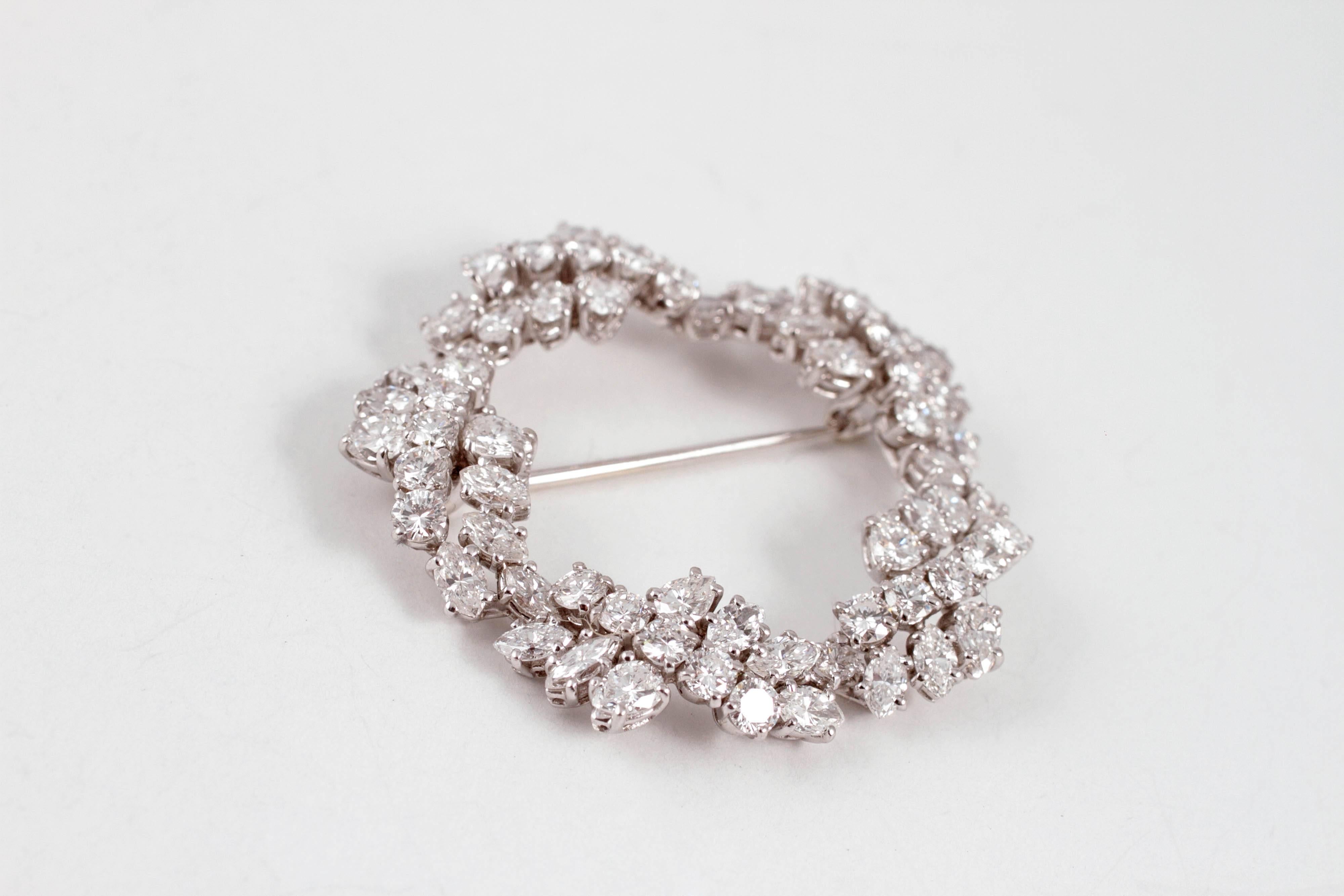 Such a timeless classic!  This lovely brooch is composed of platinum, with a straight pin clasp and supports approximately 6.50 carats of diamonds.