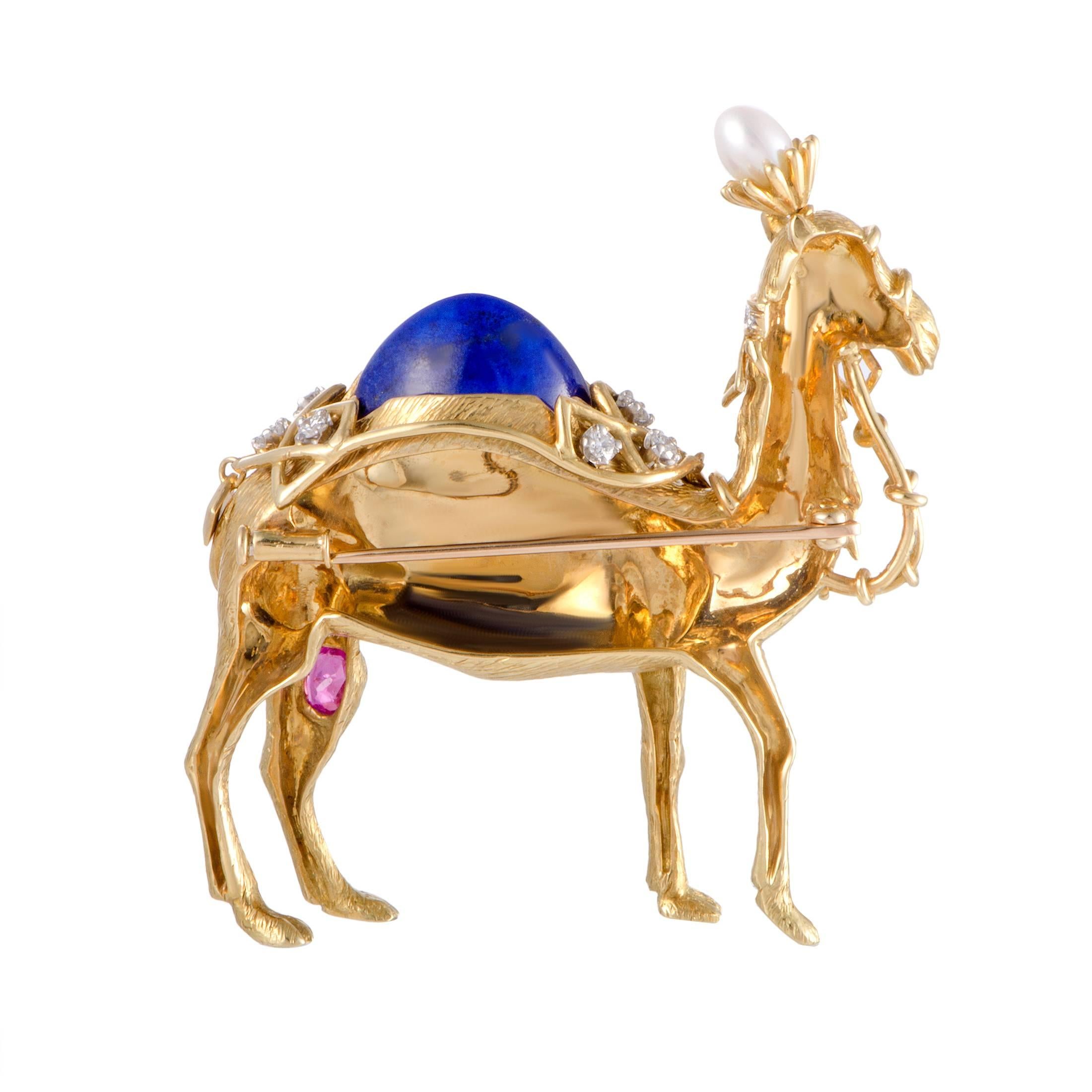 Designed by Jean Schlumberger for Tiffany & Co., this marvelous piece compels with its exquisite craftsmanship quality and lavish décor. The brooch depicts a camel and it is made of luxurious 18K yellow gold, embellished with lapis lazuli, ruby,