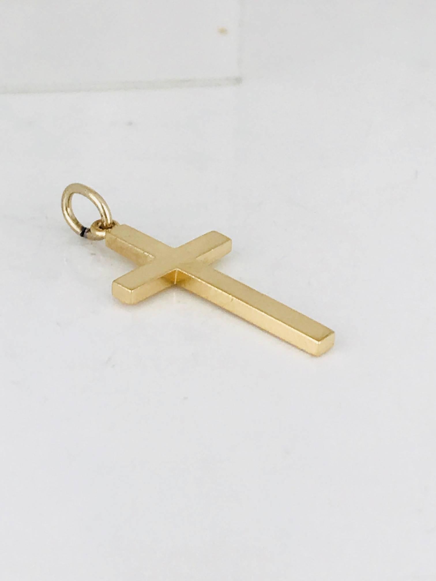 14 karat yellow gold, Tiffany & Co. Cross.
Circa 1970
Signed, Tiffany & Co, 14 kt

GIA Gemologist inspected & evaluated