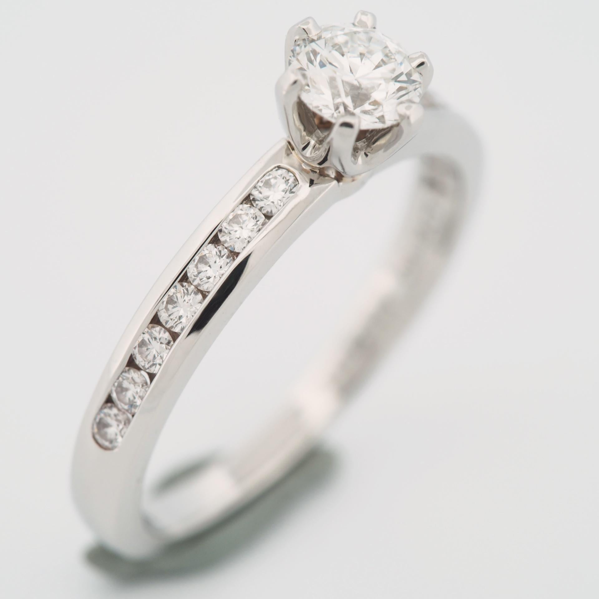 Tiffany 0.38 Carat Solitaire Diamond Ring PT950 with Channel Set Diamonds For Sale 2