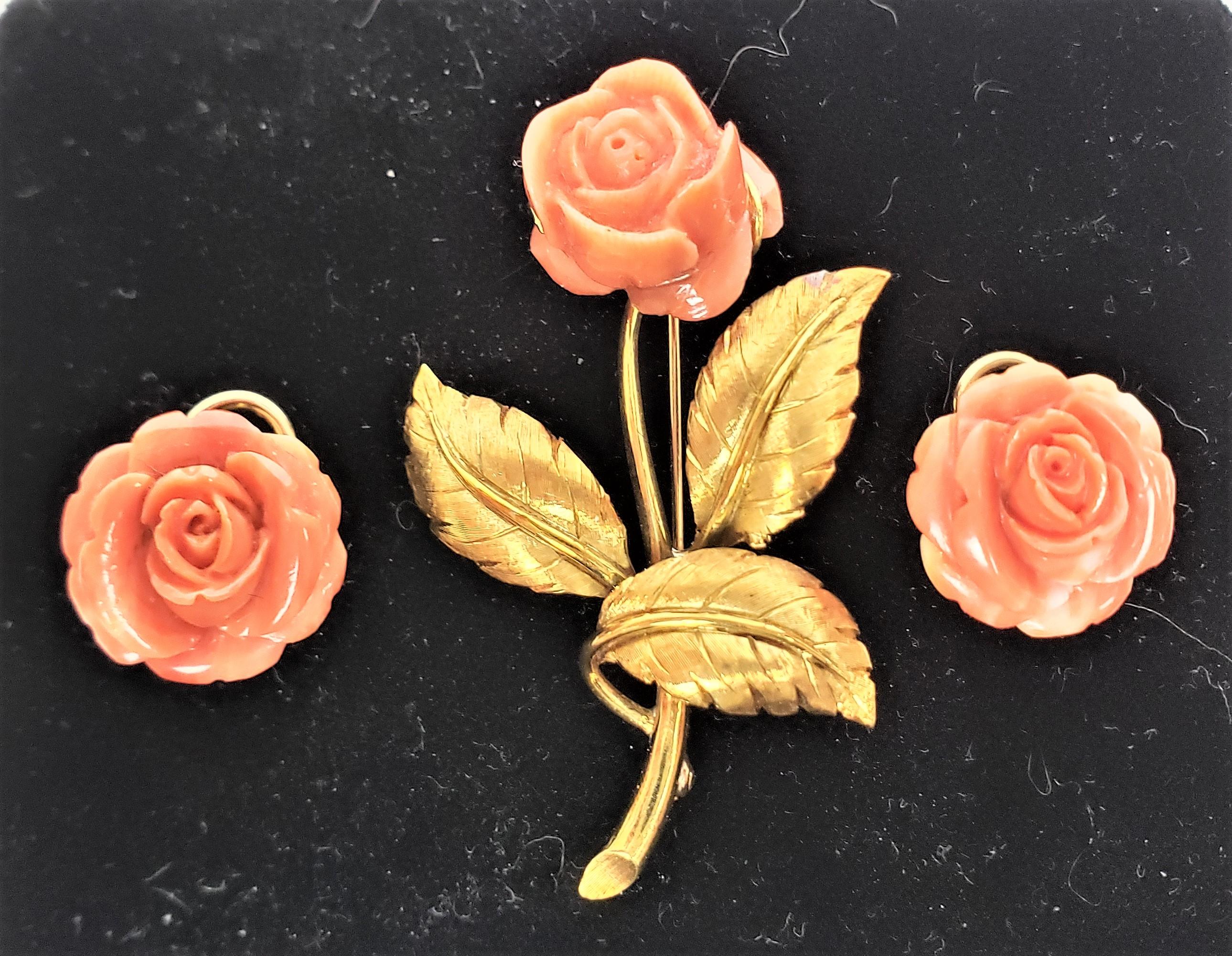 This antique brooch was retailed by Tiffany & Co., but originated from italy and date to approximately 1920 and done in a Naturalistic style. The origins of the matching earrings is unknown, and are done in the same style. The brooch is a figural