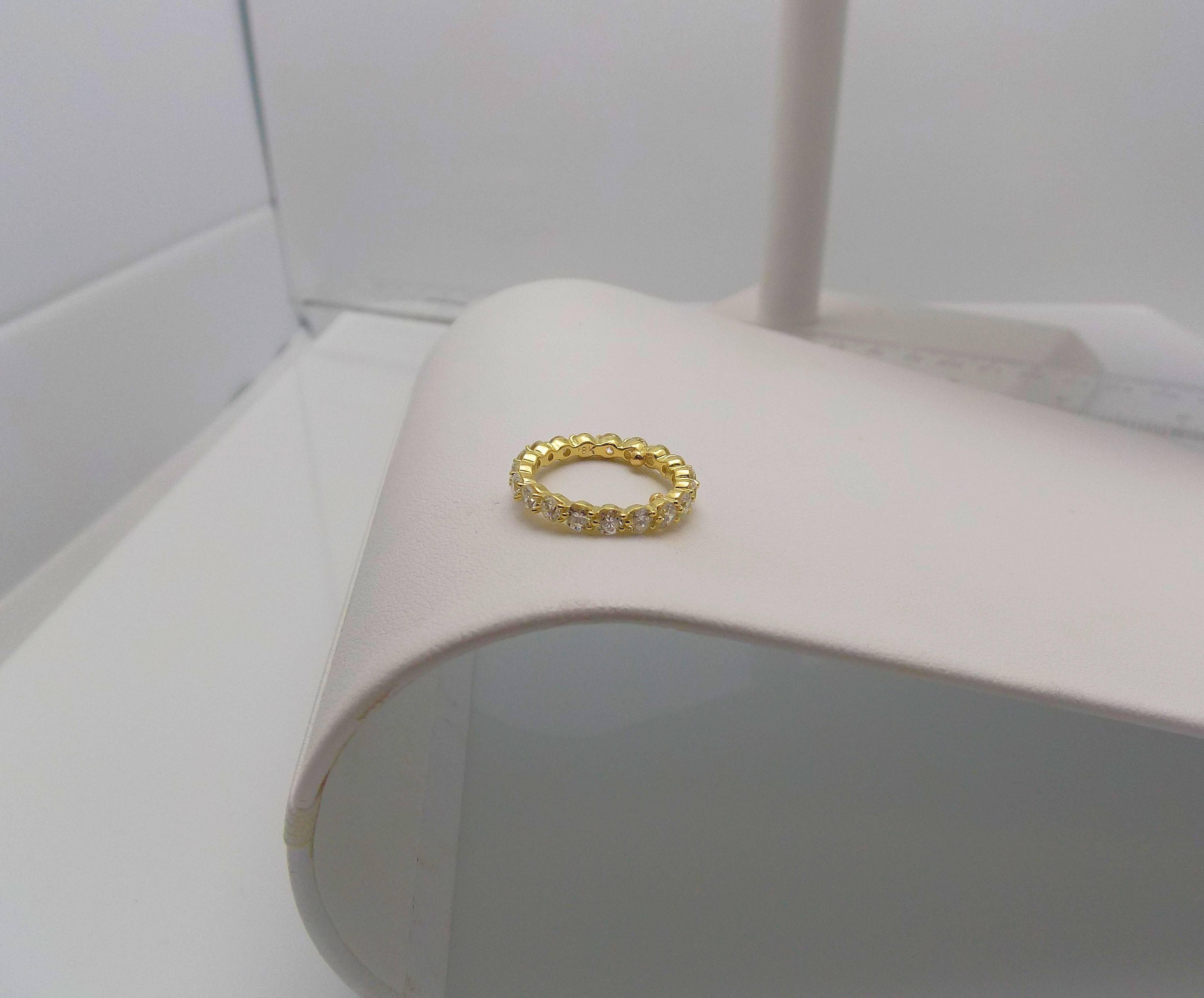 Tiffany & Co. 18 Karat Yellow Gold Diamond Eternity Band In Excellent Condition In Dallas, TX