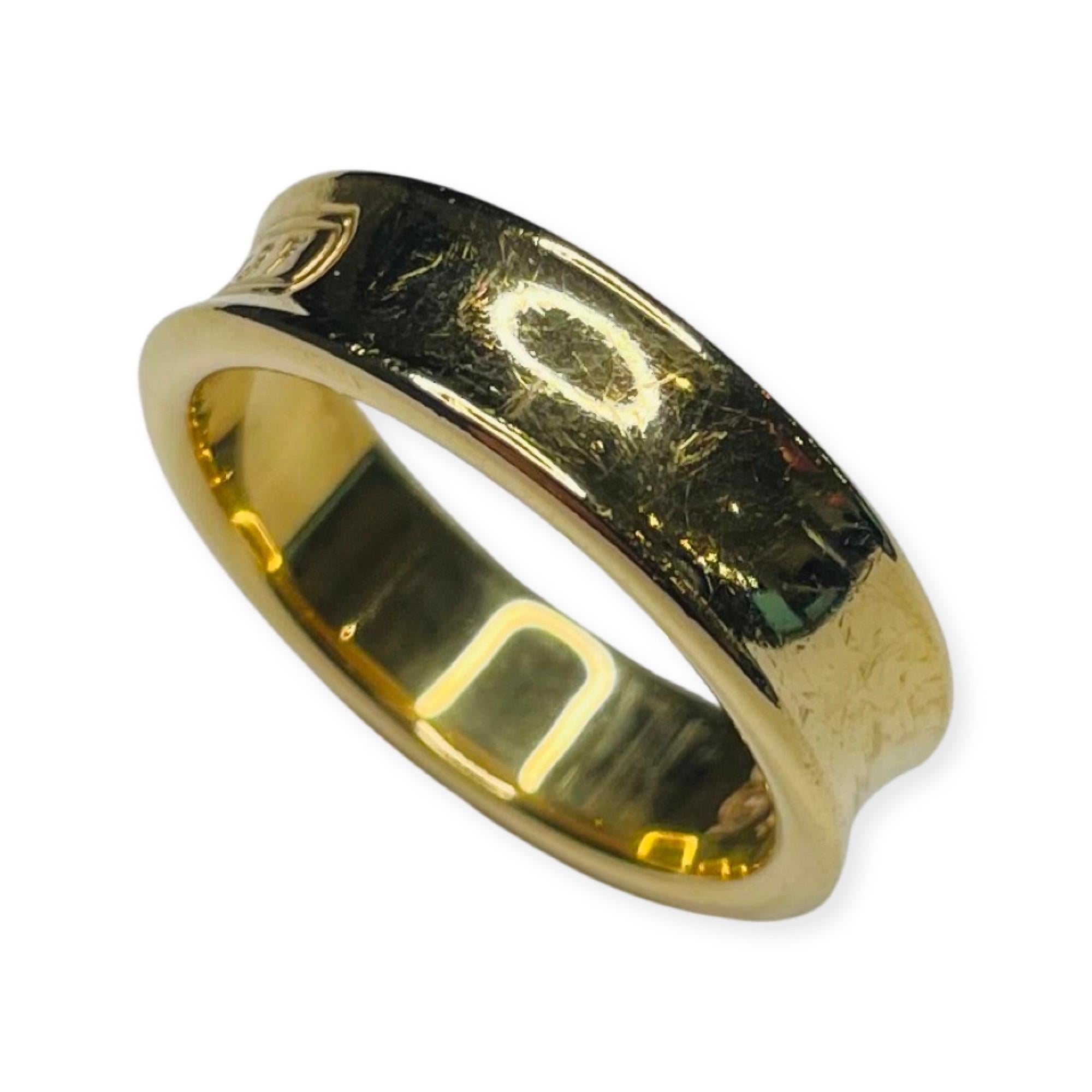 Tiffany 18K Yellow Gold Wedding Band 1897.  This ring is 6.0 mm in width. It is in excellent condition. It comes with the original Tiffany box. It is finger size 8.