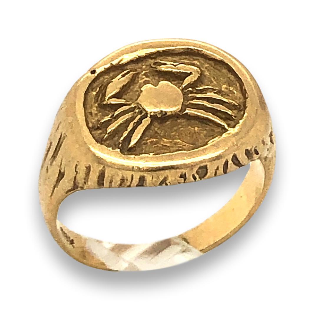 Vintage Cancer Zodiac ring by Tiffany and Co. The 18k yellow gold bark like shank with a 1/2