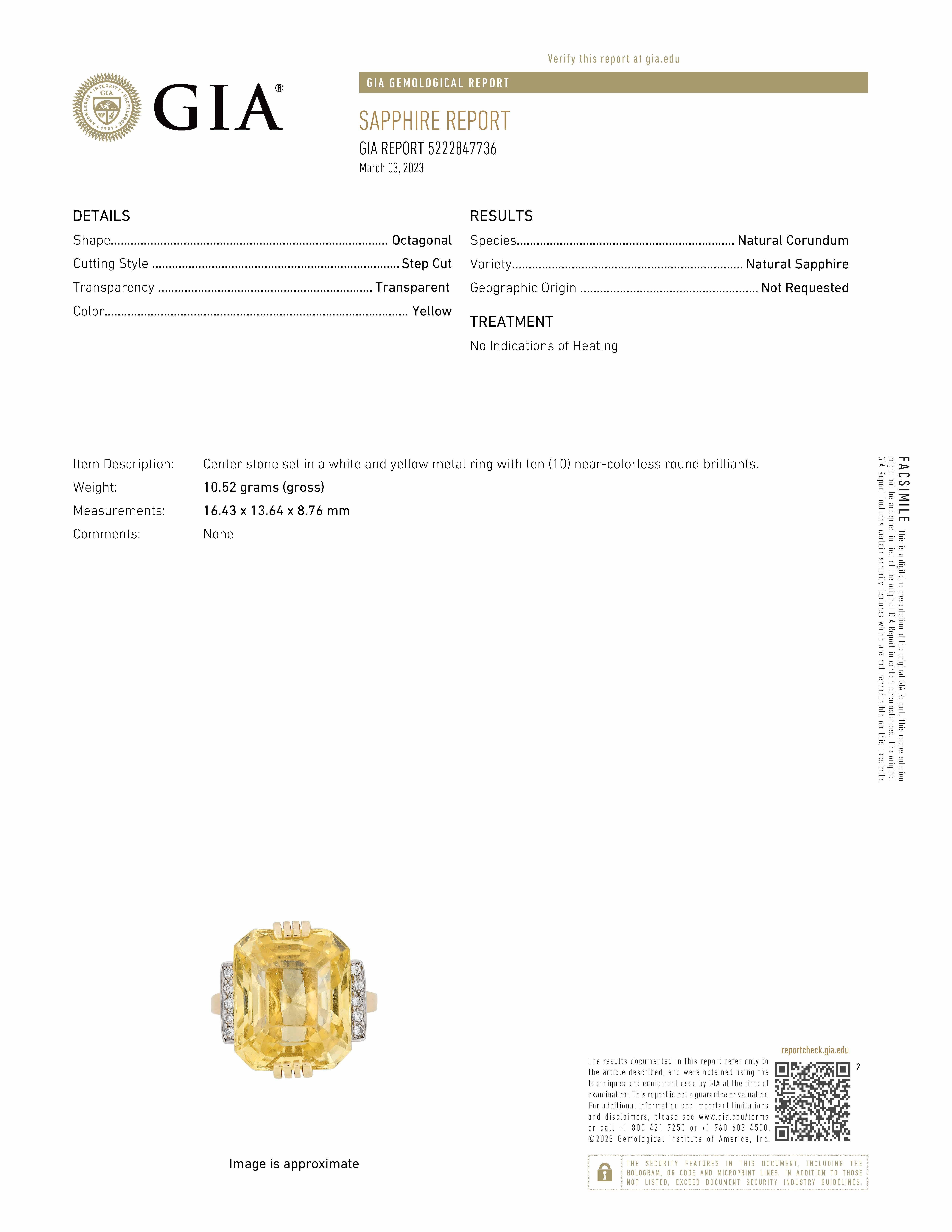 Retro cocktail ring, centering a fine 19.77 carat natural yellow sapphire measuring 16.43 x 13.64 x 8.76mm.  Ten round-cut diamonds accent the sides of the yellow gold mounting weighing approximately 0.10 total carats.  Accompanied by the GIA report
