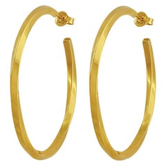 Tiffany, a pair of twist hoop earrings English hallmarked 18 ct yellow gold 