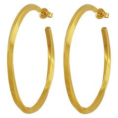 Tiffany, a pair of twist hoop earrings English hallmarked 18 ct yellow gold