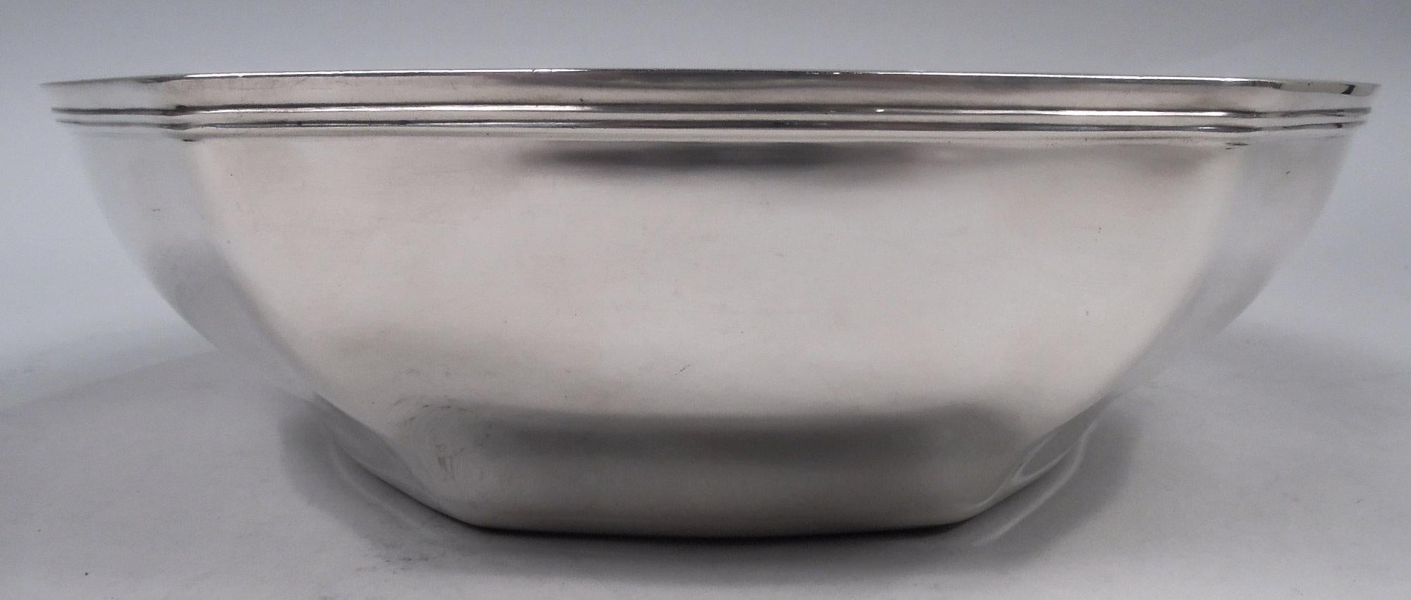 Art Deco Sterling silver bowl. Made by Tiffany & Co. in New York, ca 1911. Hexagonal with curved and tapering sides and reeded rim. A soft version of the incipient geometric style. Fully marked including maker’s stamp, pattern no. 18165 (first
