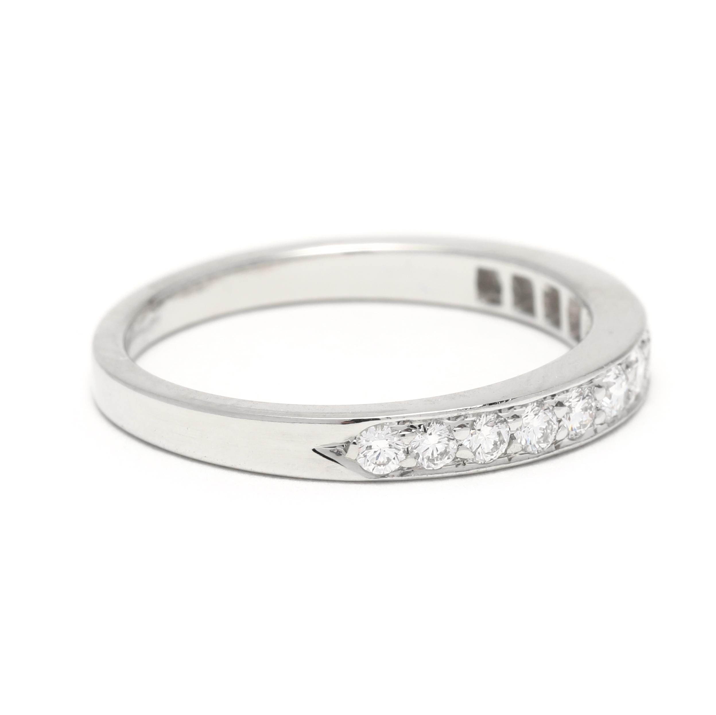 Stones:
- diamonds, 13 stones
- round brilliant cut
- 1.75 - 1.9 mm
- approximately .13 total carats

Ring Size 5

Rise Off Of Finger: 2 mm

Width: 2.6 mm

Weight: 2 dwts. / 3.1 grams

Stamps: PLAT (PT950)

A Couple Of Things to Note:
* This is a