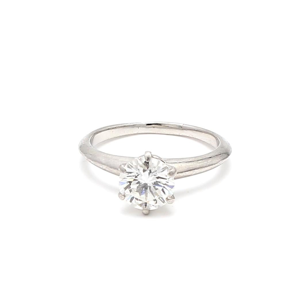 Designer:
Tiffany and Co
Title:
Tiffany and Co 1.25 Carat H-VS1 Platinum Engagement Ring
Style:
Engagement
Metal:
Platinum
Gemstone 1:
1.25 Carat Diamond
Number of Stones:
1
Color:
H
Clarity:
VS1
Shape:
Round Brilliant
Size:
5.75
Weight:
4.2