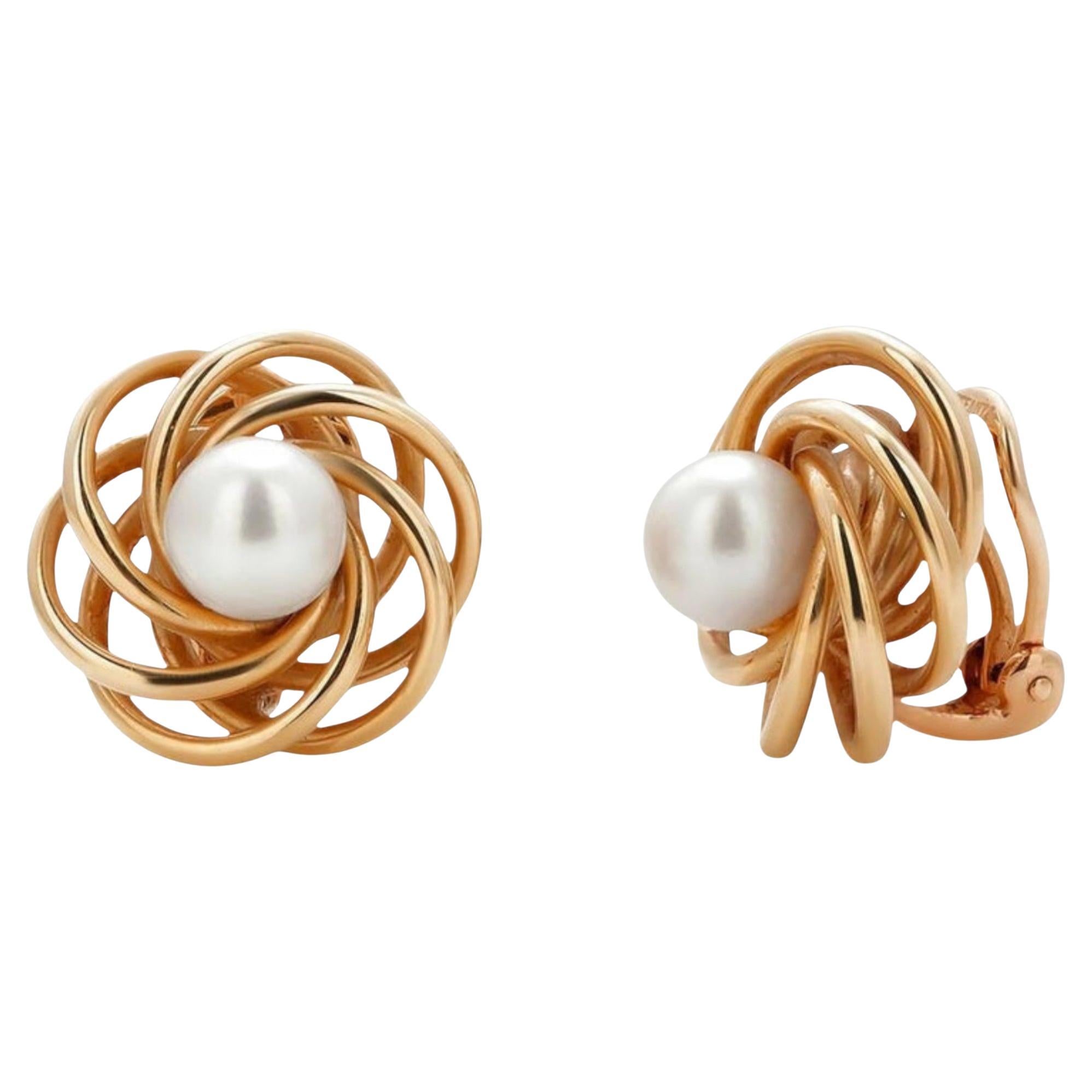 Tiffany and Co. Boucles d
oreilles vintage à levier en or jaune 14 carats avec perles