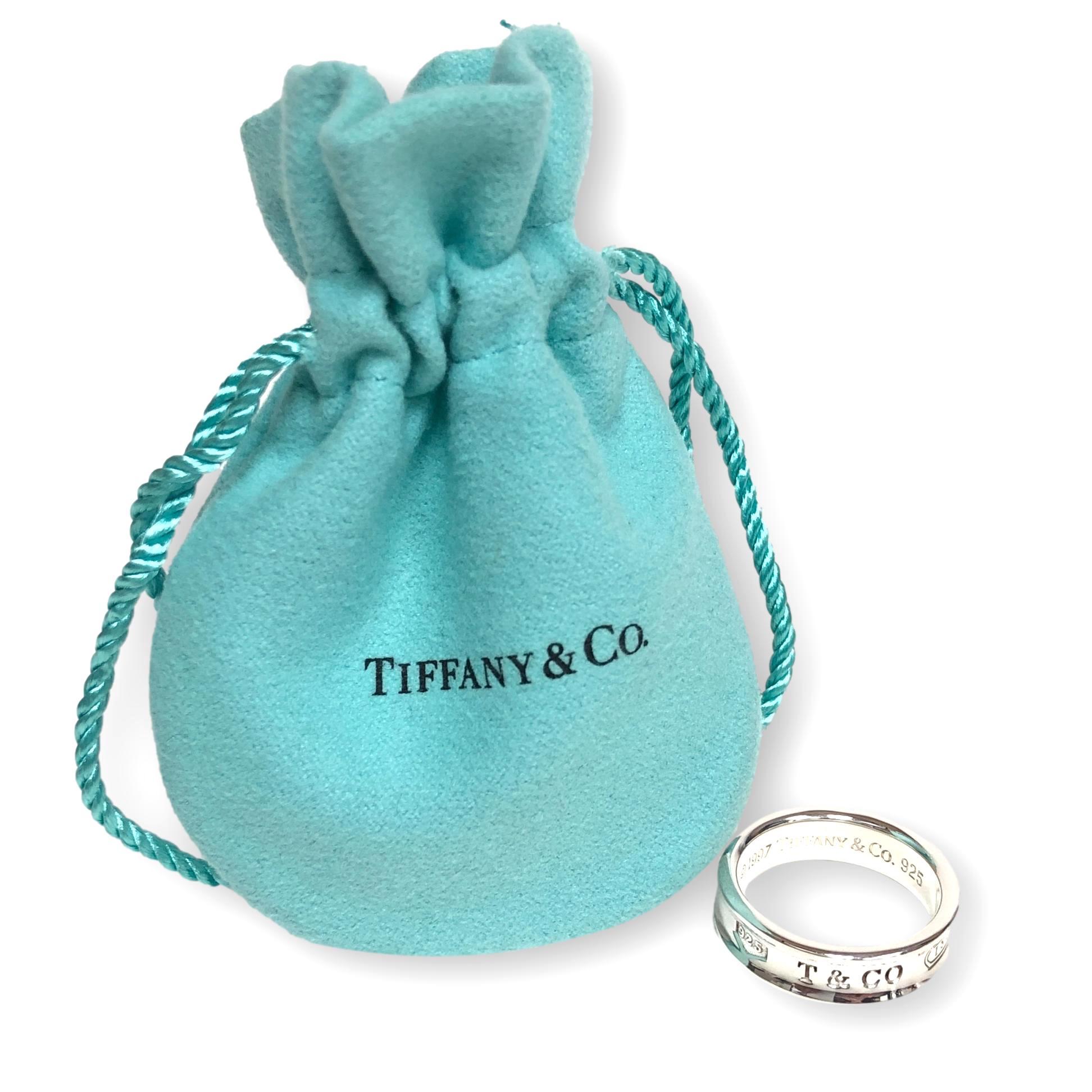 Tiffany and Co. 1837 Sterling Silver Contoured Band Ring, Medium In Excellent Condition In New York, NY