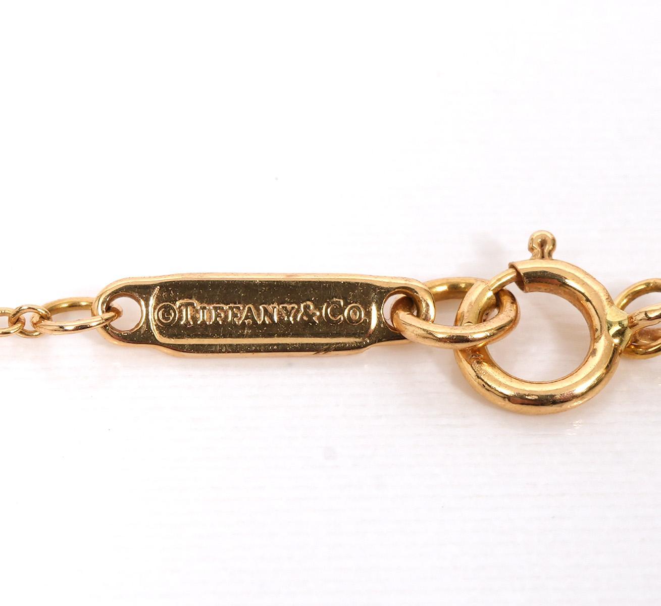 Taglio rotondo Tiffany & Co. Collana con fiocco delicato in oro rosa 18 carati e diamanti in vendita