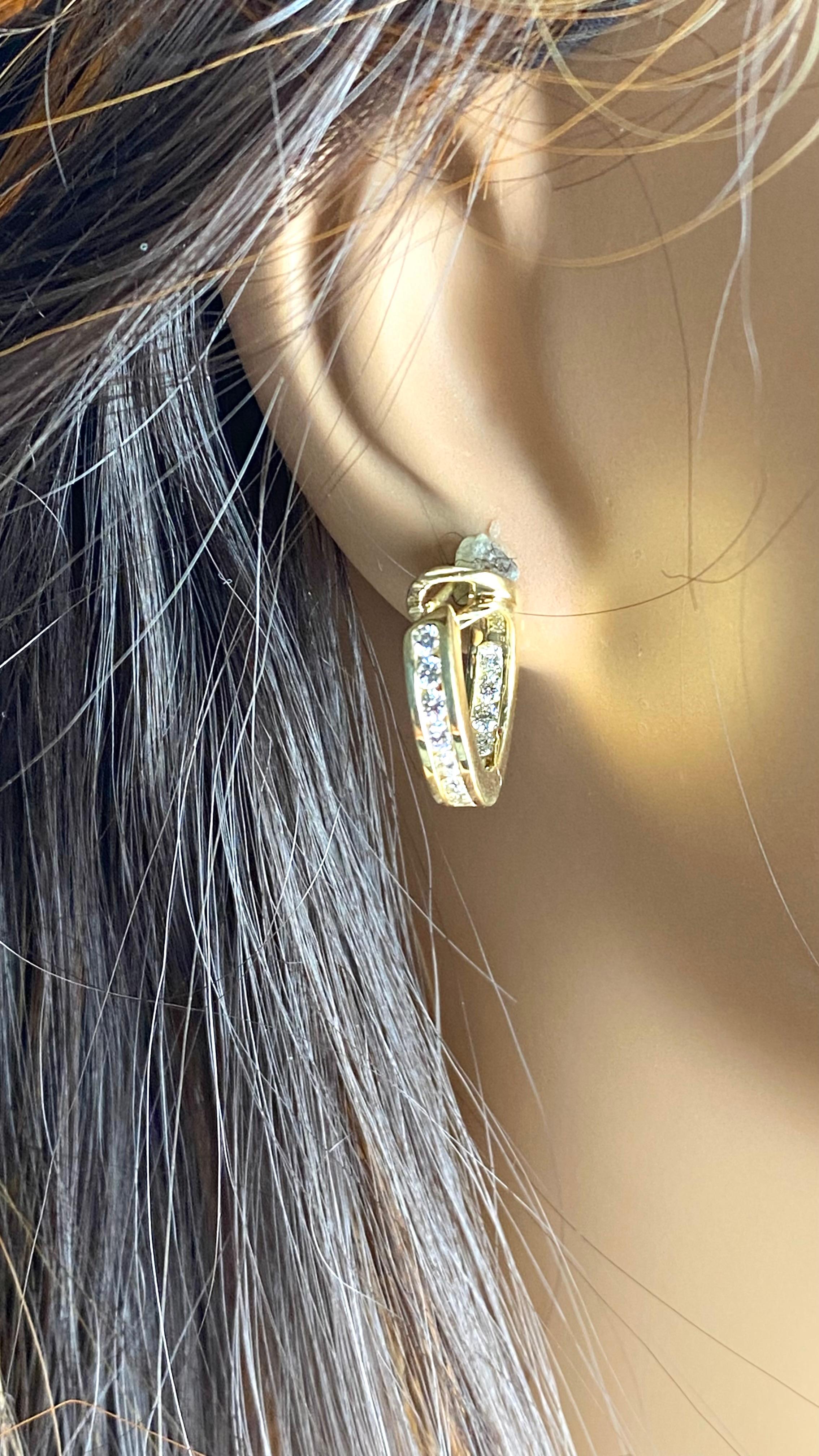 A Timeless Blend of Elegance and Luxury
Elevate your jewelry collection with these exquisite Tiffany & Co. 18K Yellow Gold Diamond Hoop Earrings. Meticulously crafted by one of the world's most renowned luxury jewelers, these earrings embody