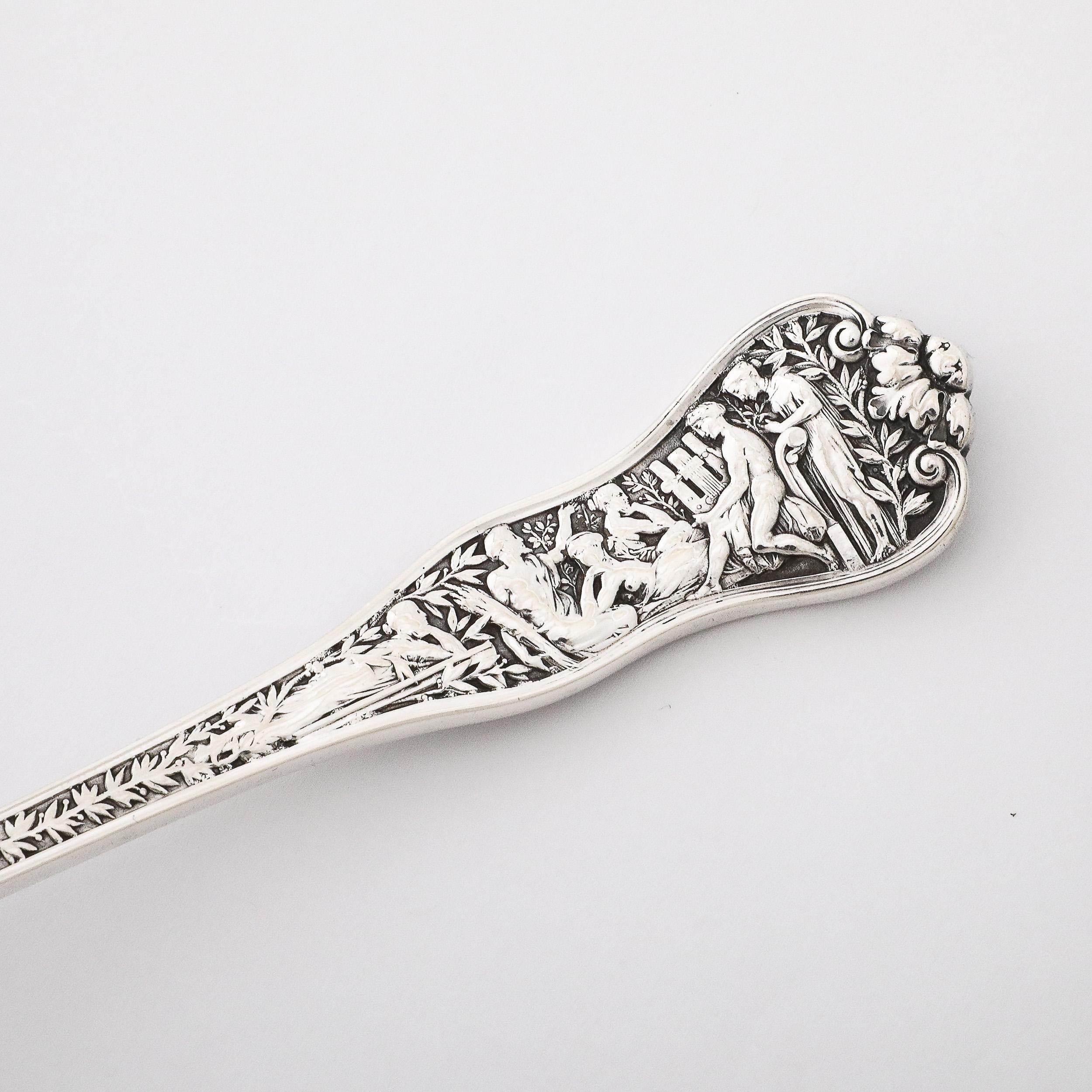 Tiffany and Co. 19th Century Sterling and Gold Serving Spoon in Olympian Pattern In Excellent Condition For Sale In New York, NY